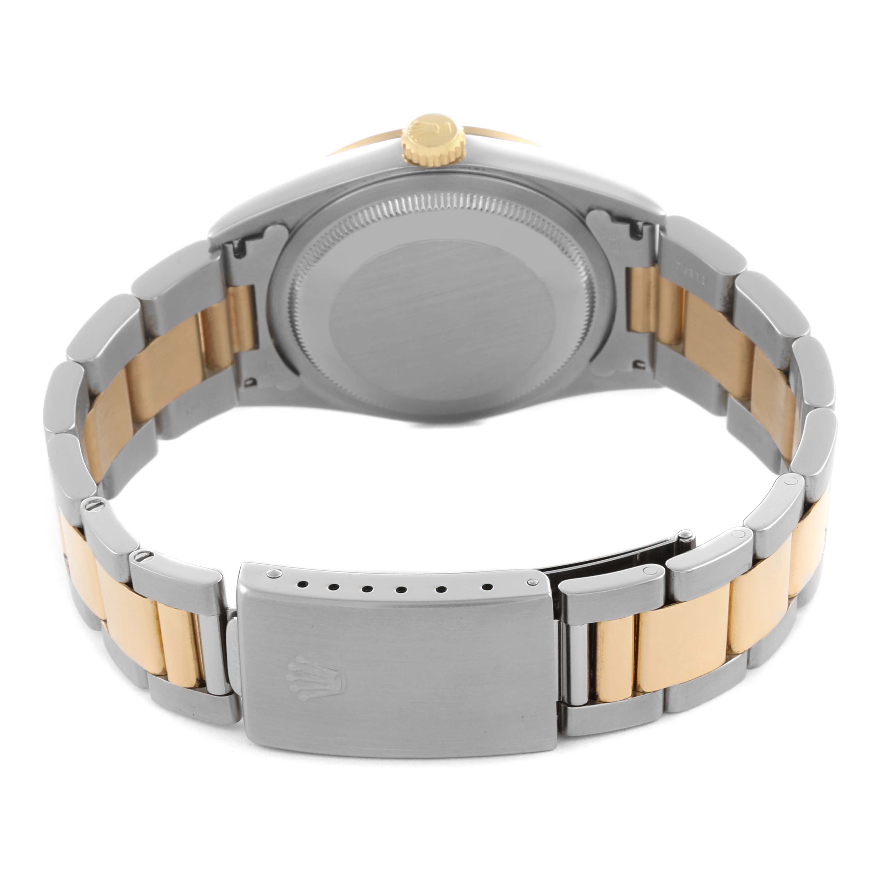 The image shows the back view of a Rolex Datejust 16203 Men's Steel and Gold (two tone) Grey Dial 16203 Men's Steel and Gold (two tone) Grey Dial watch, focusing on its two-tone bracelet and closed clasp.