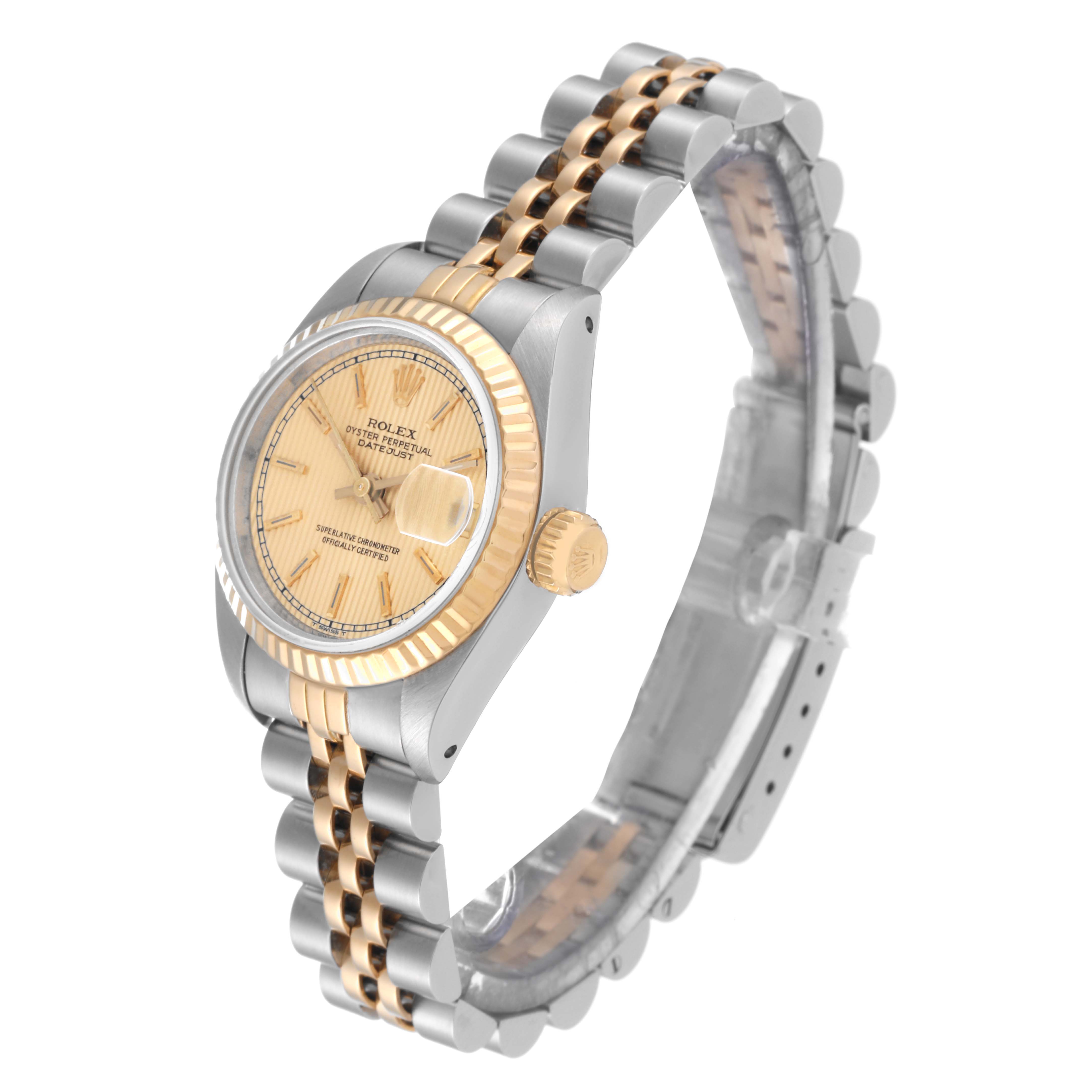 The Rolex Datejust 69173 Women's Steel and Gold (two tone) Champagne Dial 69173 Women's Steel and Gold (two tone) Champagne Dial model watch is shown at an angle displaying its face, crown, and two-tone bracelet.