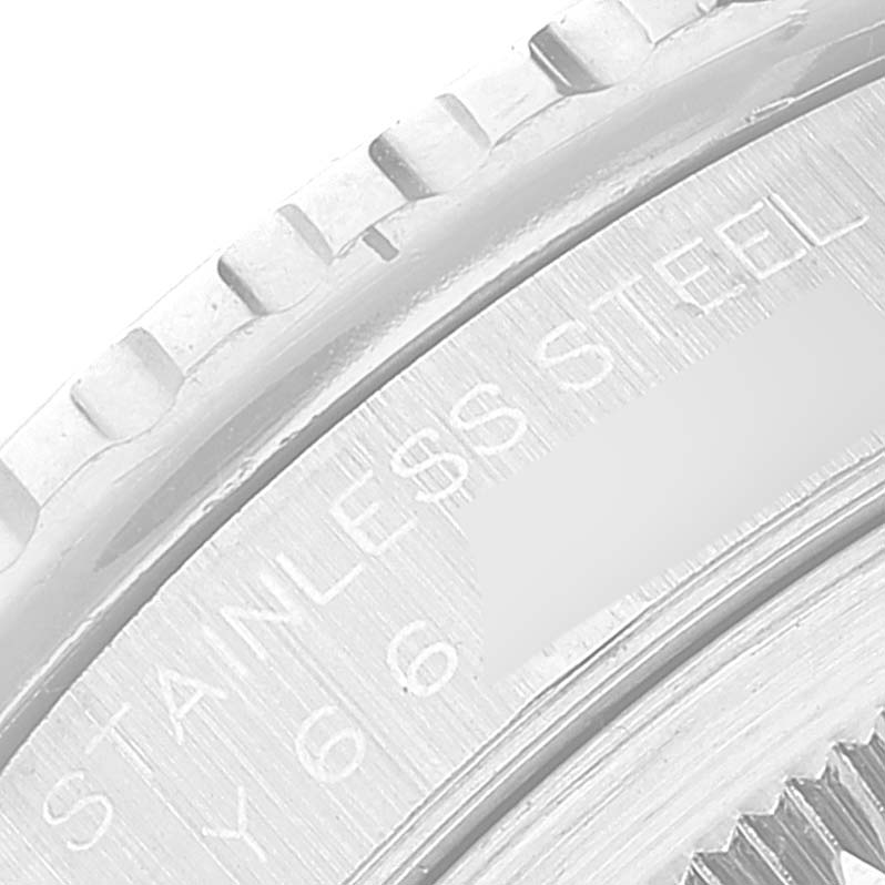 Close-up of the Rolex Turn-o-Graph 16264 Men
s Stainless Steel Blue Dial 16264 Men
s Stainless Steel Blue Dial watch bezel and part of the case, highlighting the stainless steel text.