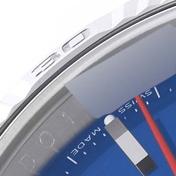This image shows a close-up of the bezel, chapter ring, and part of the dial of a Rolex Turn-o-Graph 116264 Men
s Stainless Steel Blue Dial 116264 Men
s Stainless Steel Blue Dial watch.