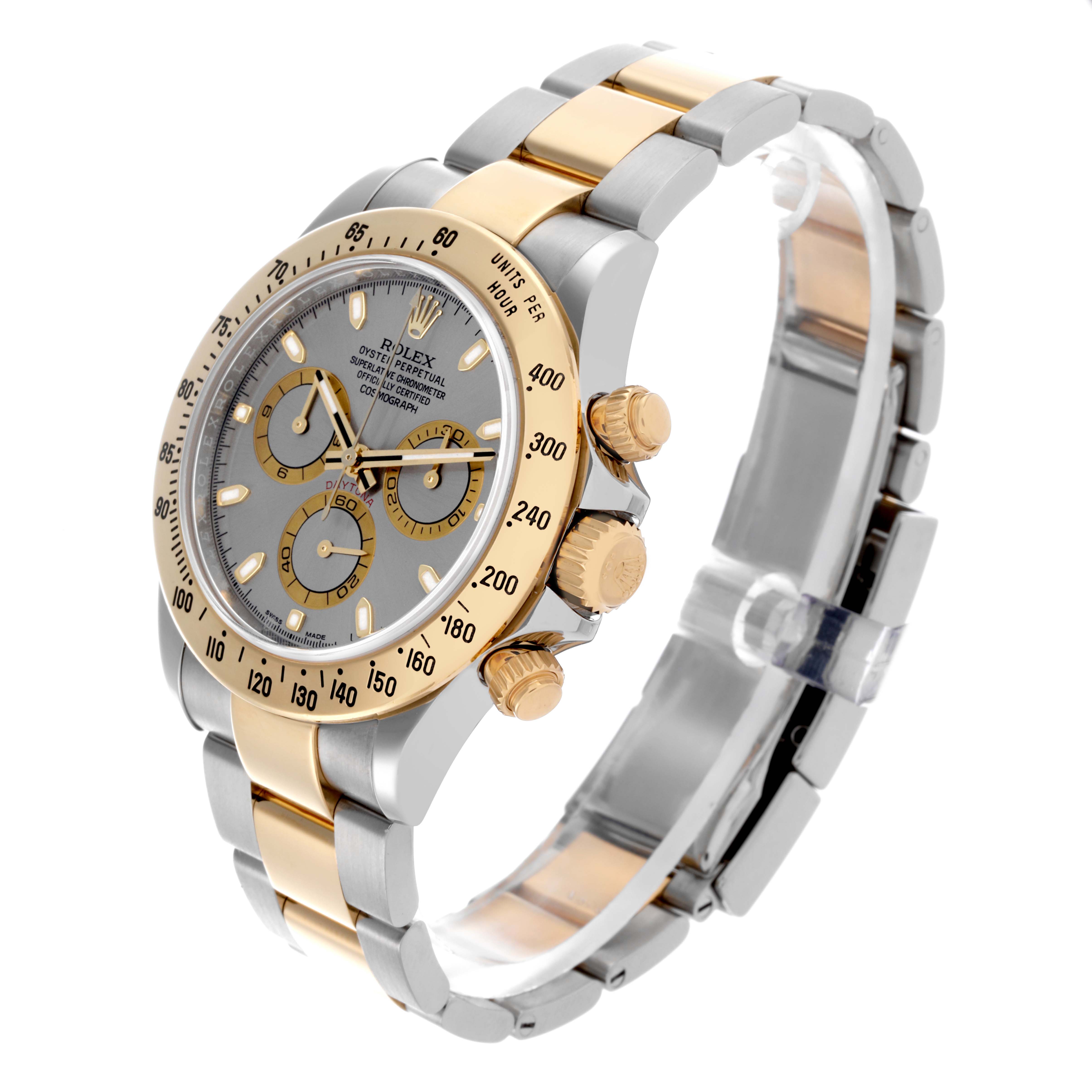 The Rolex Daytona 116523 Men's Steel and Gold (two tone) Grey Dial 116523 Men's Steel and Gold (two tone) Grey Dial watch is shown at a three-quarter angle, highlighting the face, bezel, crown, and bracelet.