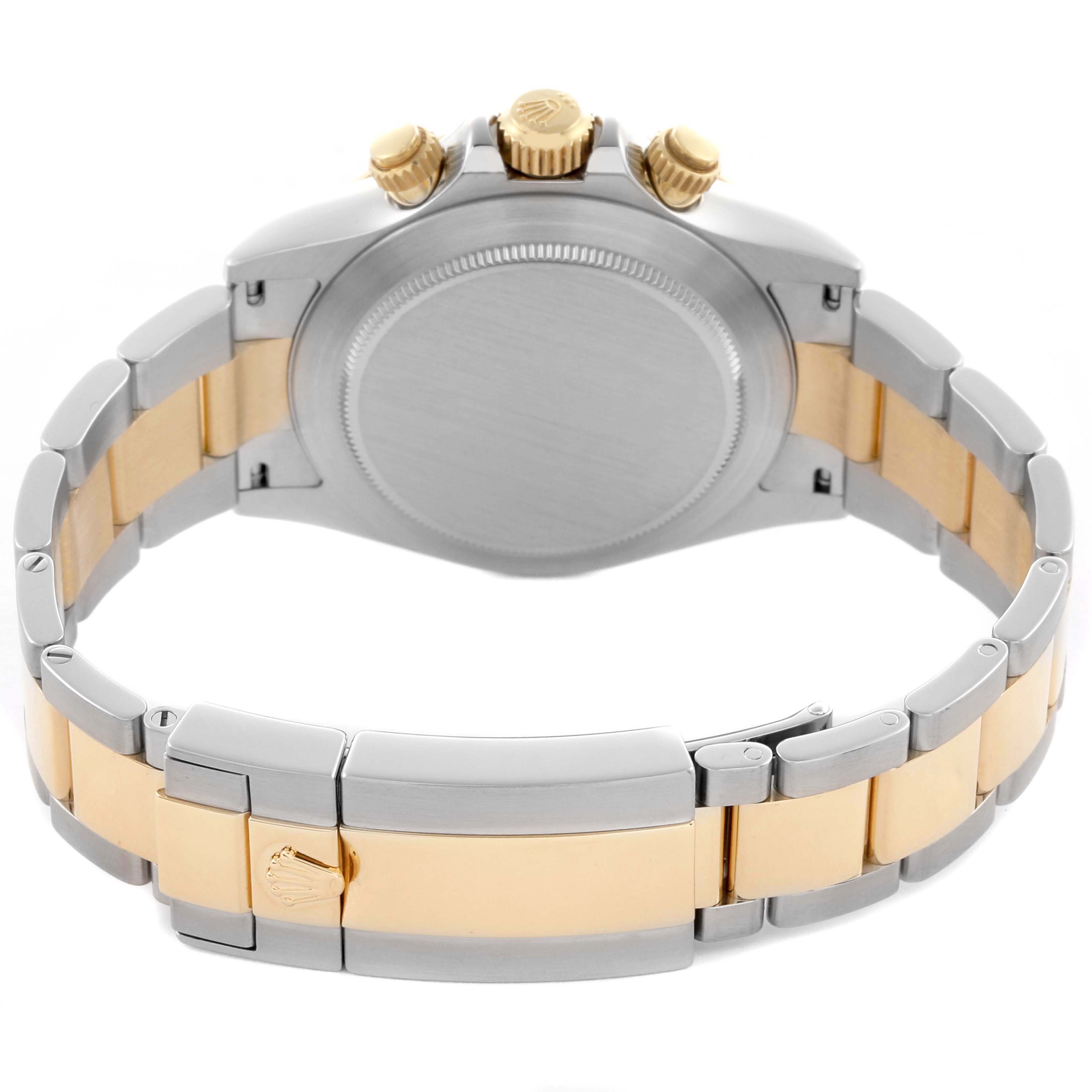 The image shows the back case, crown, pushers, and bracelet of a Rolex Daytona 116523 Men's Steel and Gold (two tone) Grey Dial 116523 Men's Steel and Gold (two tone) Grey Dial watch, viewed from a rear angle.