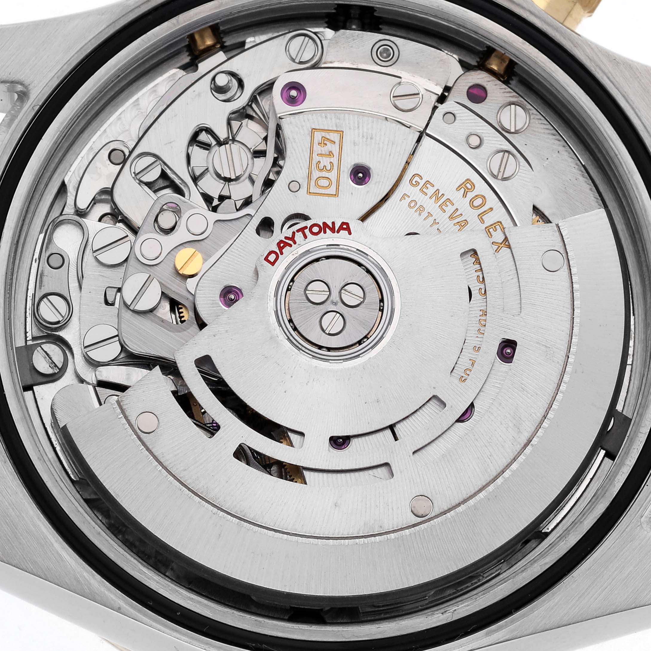 The image shows the movement of a Rolex Daytona 116523 Men's Steel and Gold (two tone) Grey Dial 116523 Men's Steel and Gold (two tone) Grey Dial watch, highlighting its intricate mechanism from a top-down angle.