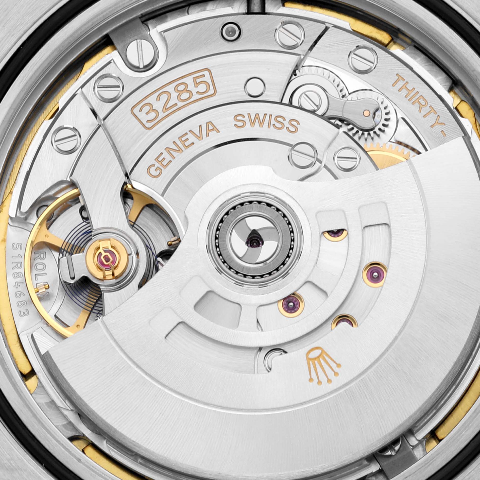 The image shows a close-up view of the movement inside a Rolex Explorer 226570 Men's Stainless Steel Black Dial 226570 Men's Stainless Steel Black Dial watch, showcasing the intricate mechanical parts.