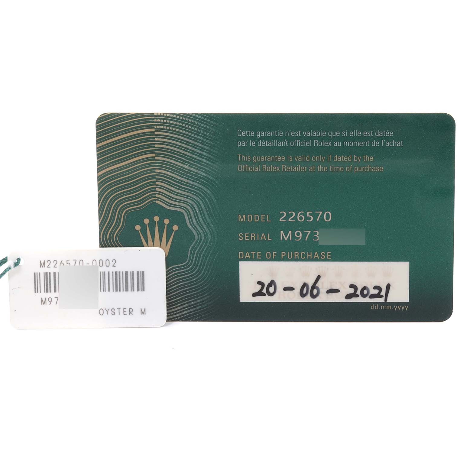 The image shows the warranty card and a tag for the Rolex Explorer 226570 Men's Stainless Steel Black Dial 226570 Men's Stainless Steel Black Dial model 226570, highlighting the serial number and date of purchase.