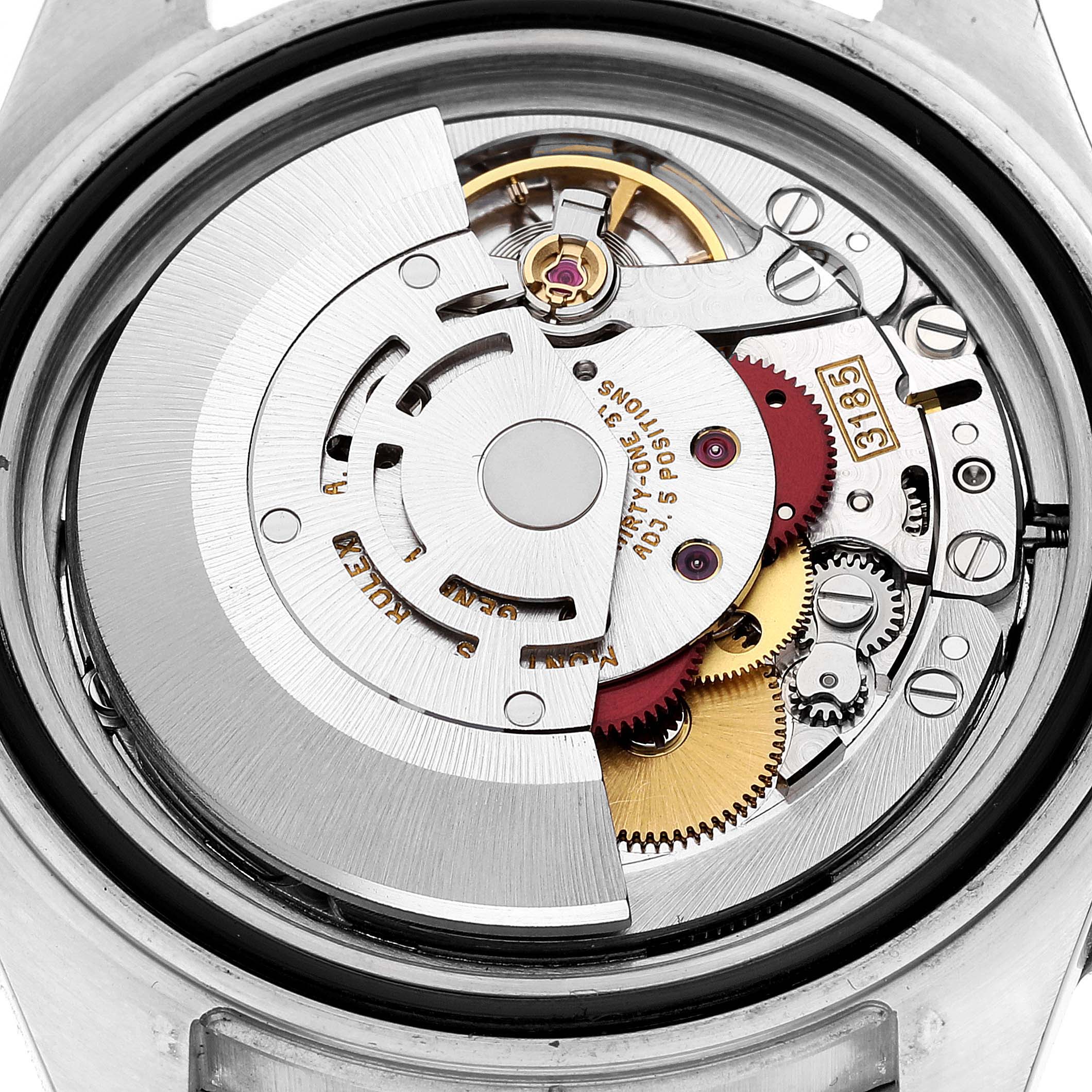 This image shows the internal mechanical movement of a Rolex GMT-Master 16713 Men's Steel and Gold (two tone) Champagne Dial 16713 Men's Steel and Gold (two tone) Champagne Dial watch.