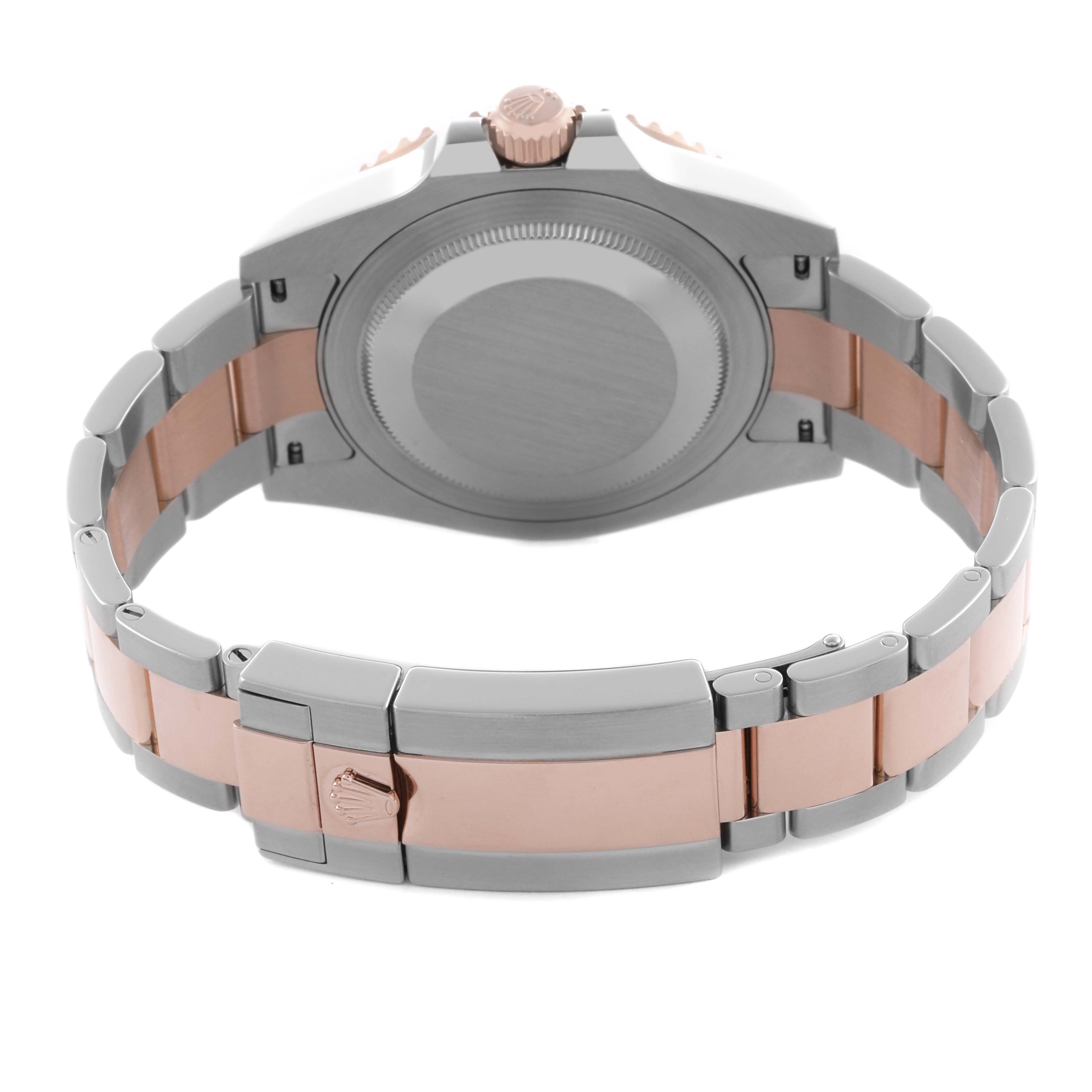 The image shows the back of the Rolex GMT-Master 126711CHNR Men's Steel and Gold (two tone) Black Dial 126711CHNR Men's Steel and Gold (two tone) Black Dial, highlighting the clasp and bracelet.