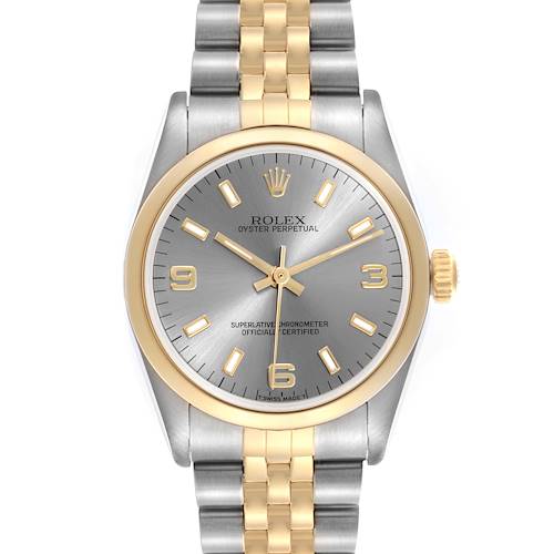 The Rolex Datejust watch is shown from a top-down angle, displaying the face, bezel, and bracelet.