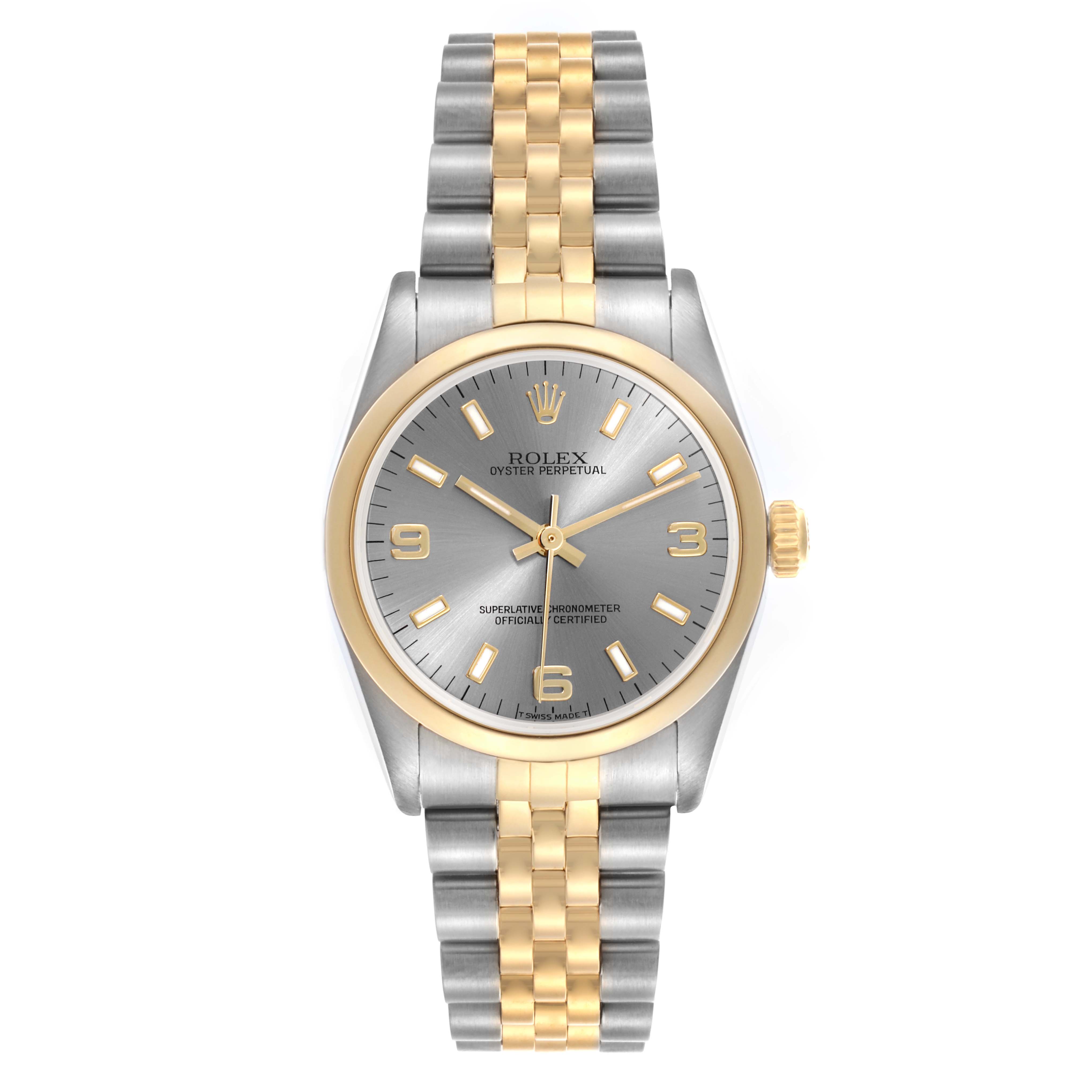 The Rolex Datejust is shown from a top-down angle, highlighting the two-tone bracelet, dial, and bezel.