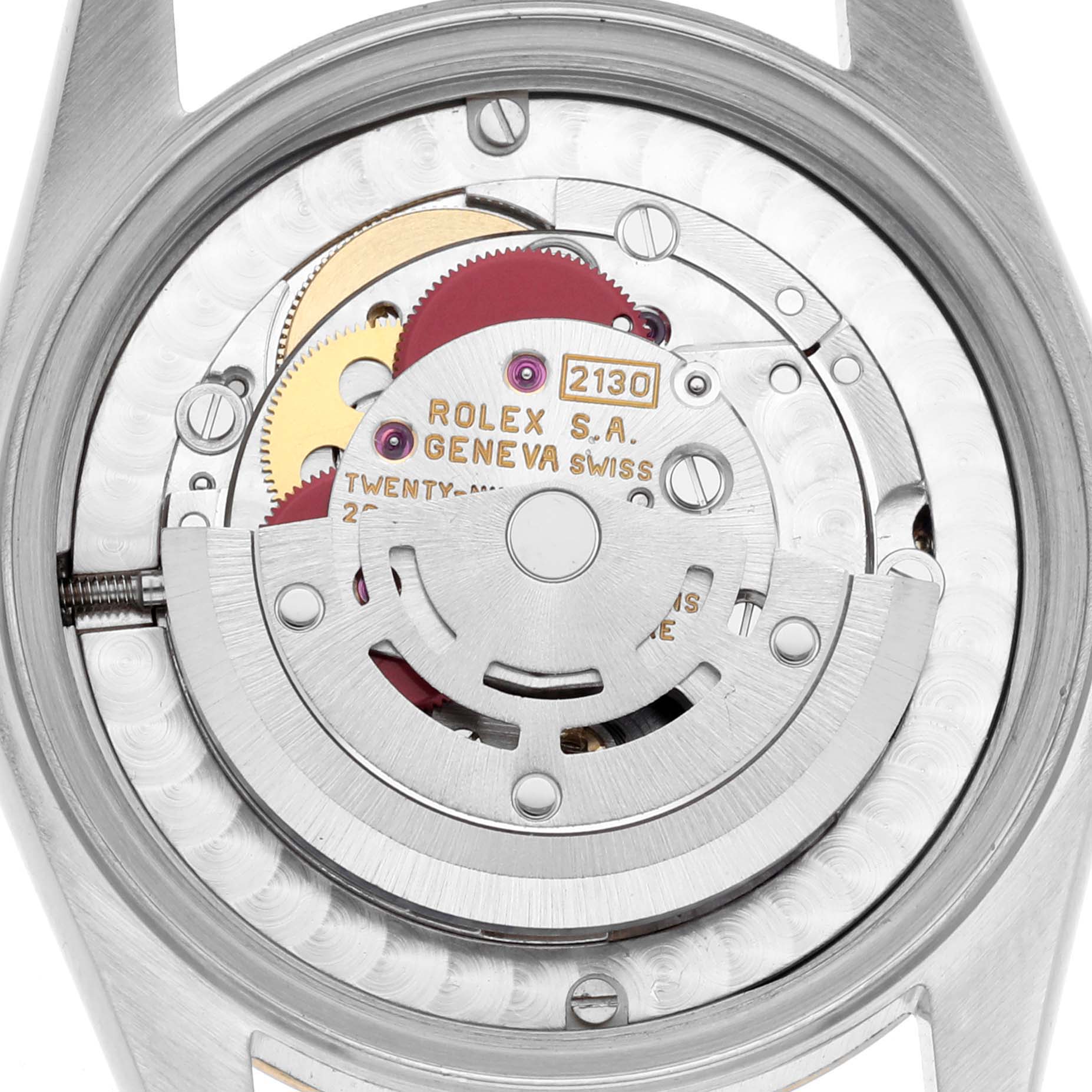 The image shows a top view of the Rolex Datejust watch movement, displaying gears and the rotor.