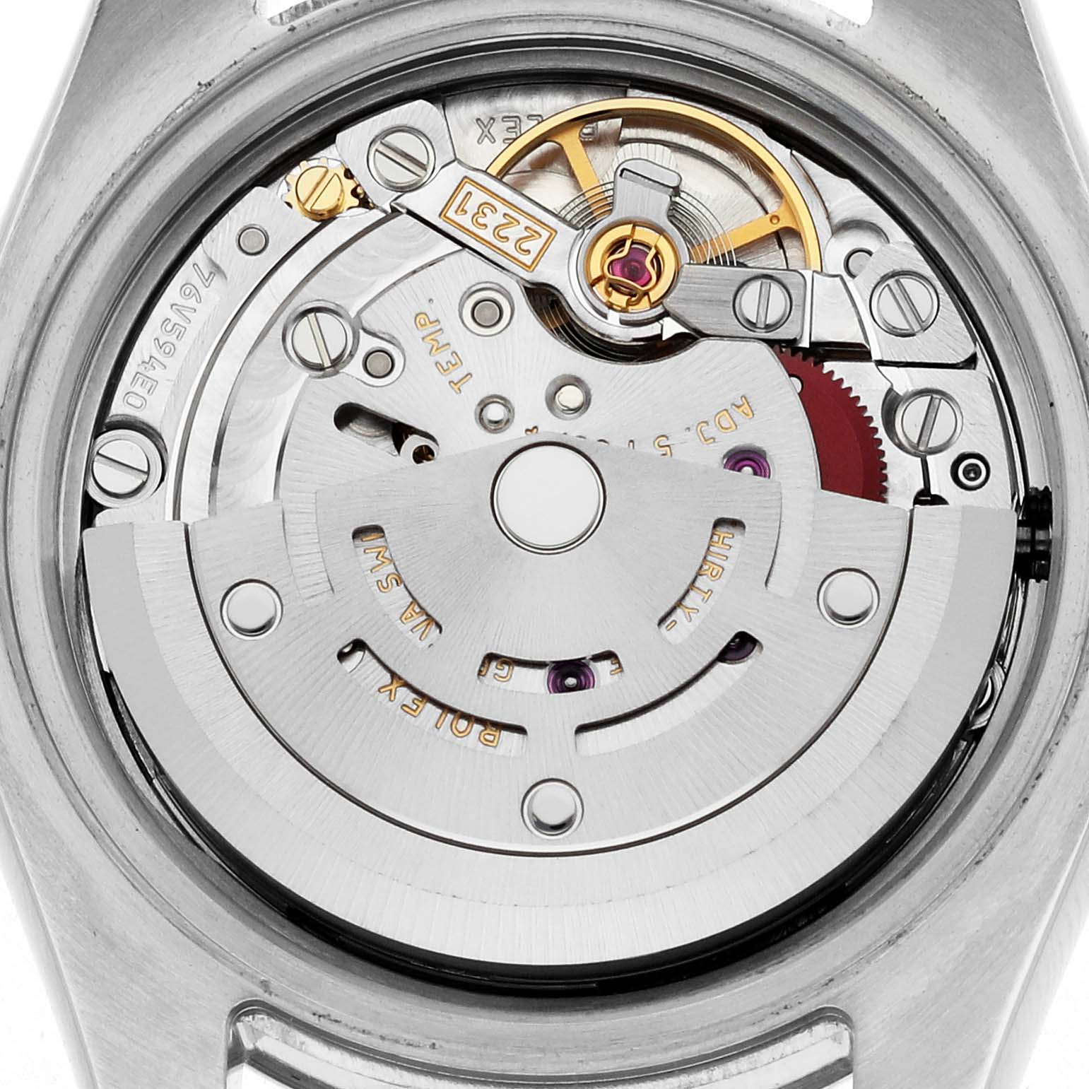 The image shows the movement of a Rolex Oyster Perpetual 176200 Women's Stainless Steel Silver Dial 176200 Women's Stainless Steel Silver Dial, viewed from the back, highlighting its intricate internal mechanisms.