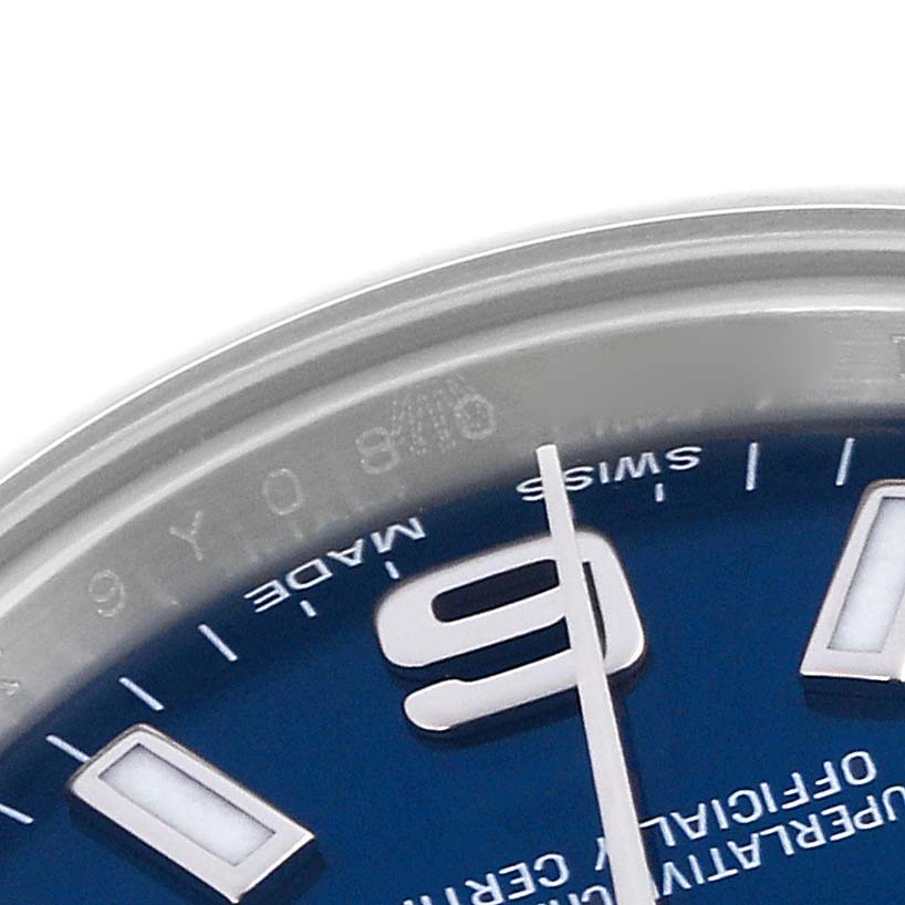 The image shows a close-up of the dial edge, markers, and hand of a Rolex Oyster Perpetual 176200 Women's Stainless Steel Blue Dial 176200 Women's Stainless Steel Blue Dial watch.