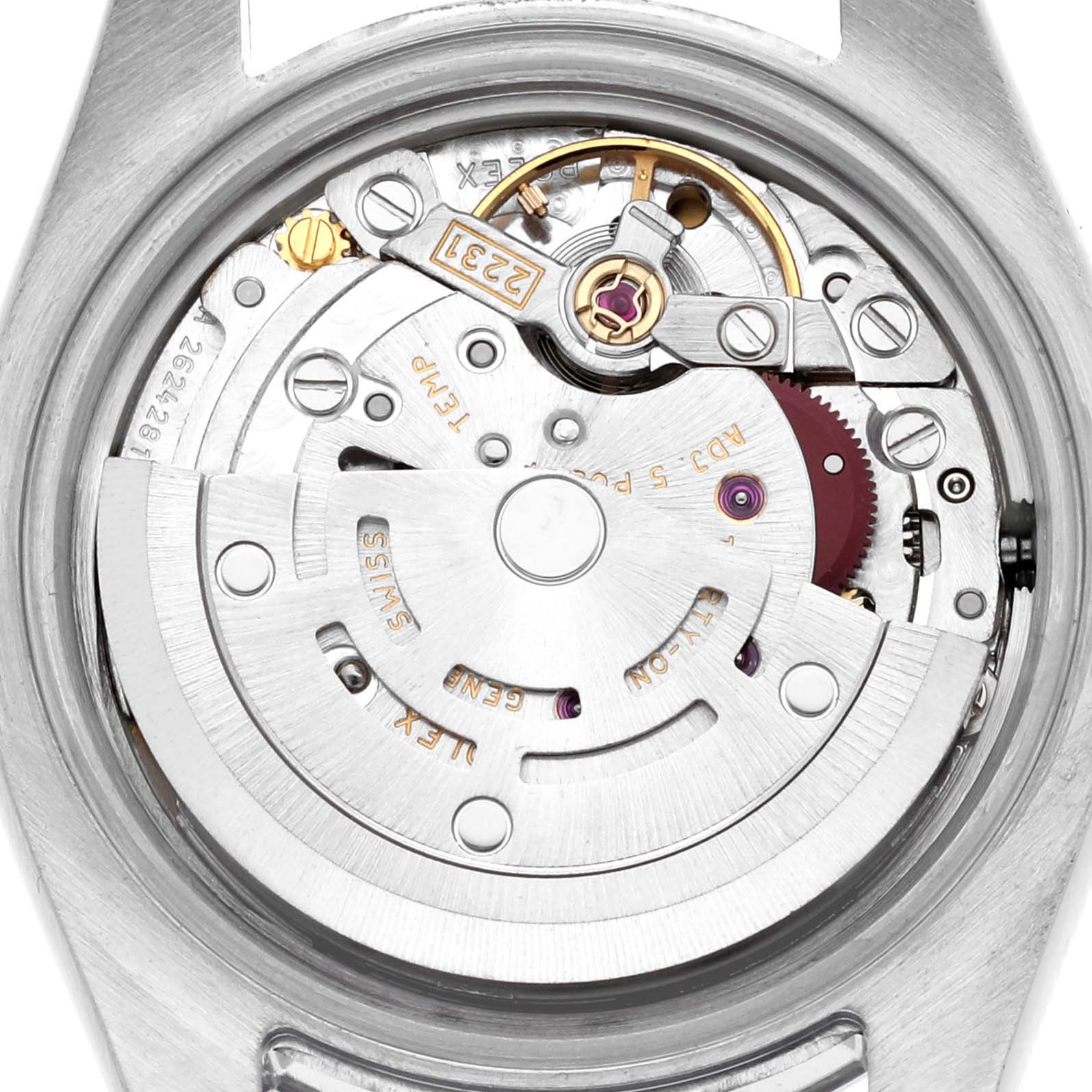The image shows the movement of a Rolex Oyster Perpetual 176200 Women's Stainless Steel White Dial 176200 Women's Stainless Steel White Dial watch from a top-down angle, highlighting its intricate gears and components.