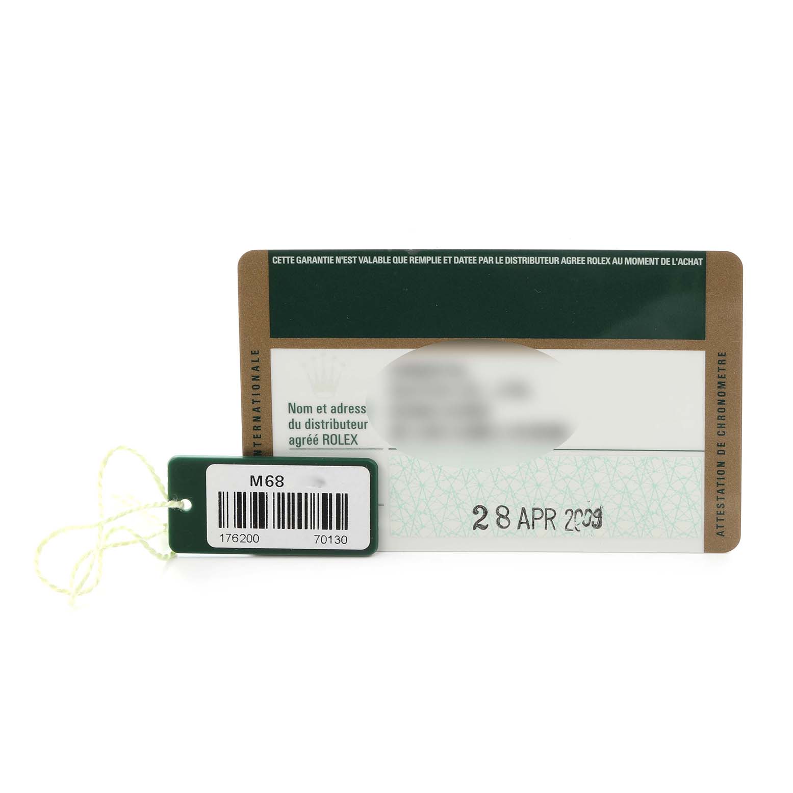 This image shows a warranty card and tag for the Rolex Oyster Perpetual 176200 Women's Stainless Steel White Dial 176200 Women's Stainless Steel White Dial model.