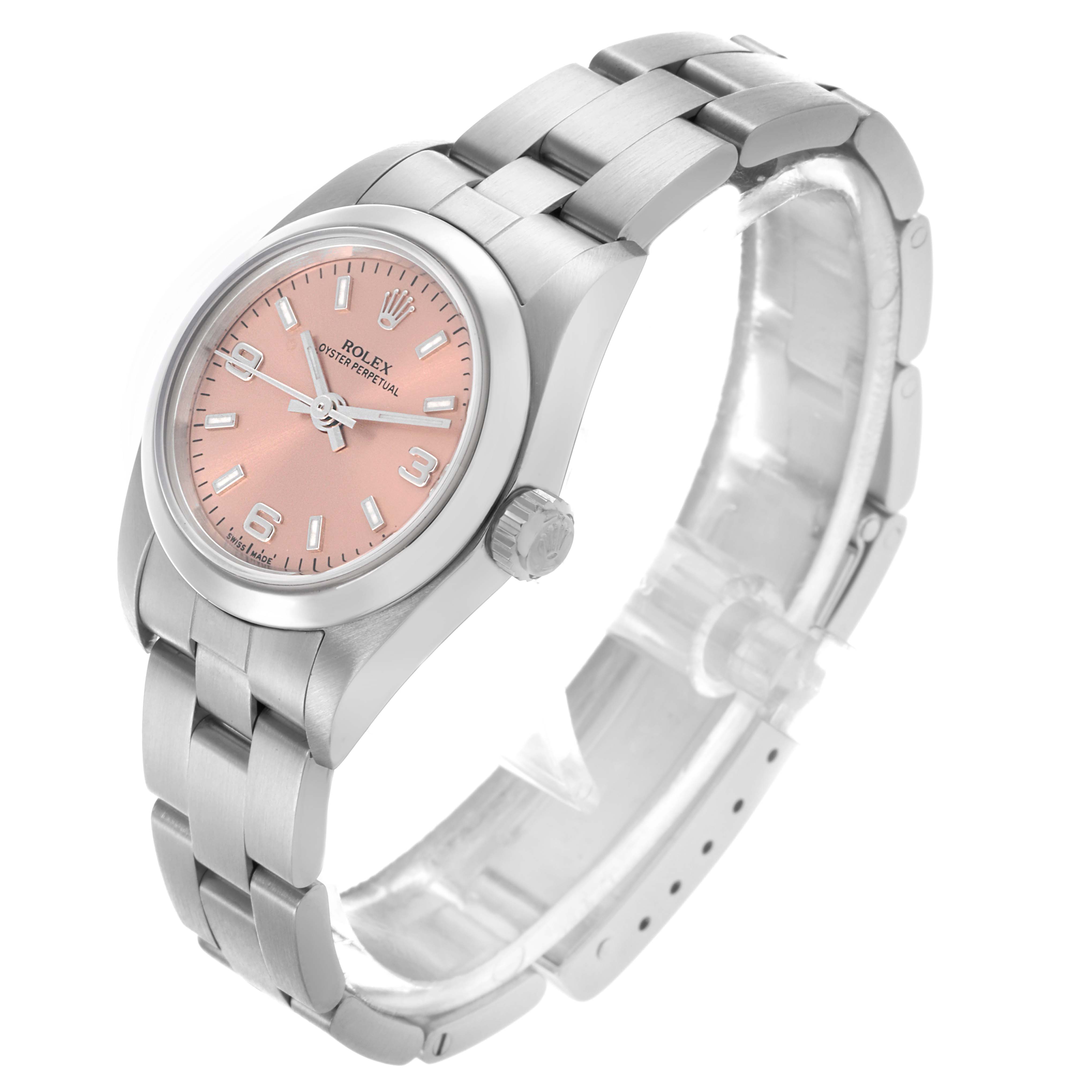 The Rolex Oyster Perpetual 76080 Women's Stainless Steel Pink Dial 76080 Women's Stainless Steel Pink Dial watch is shown from a three-quarter angle, displaying the dial, bezel, bracelet, and crown.
