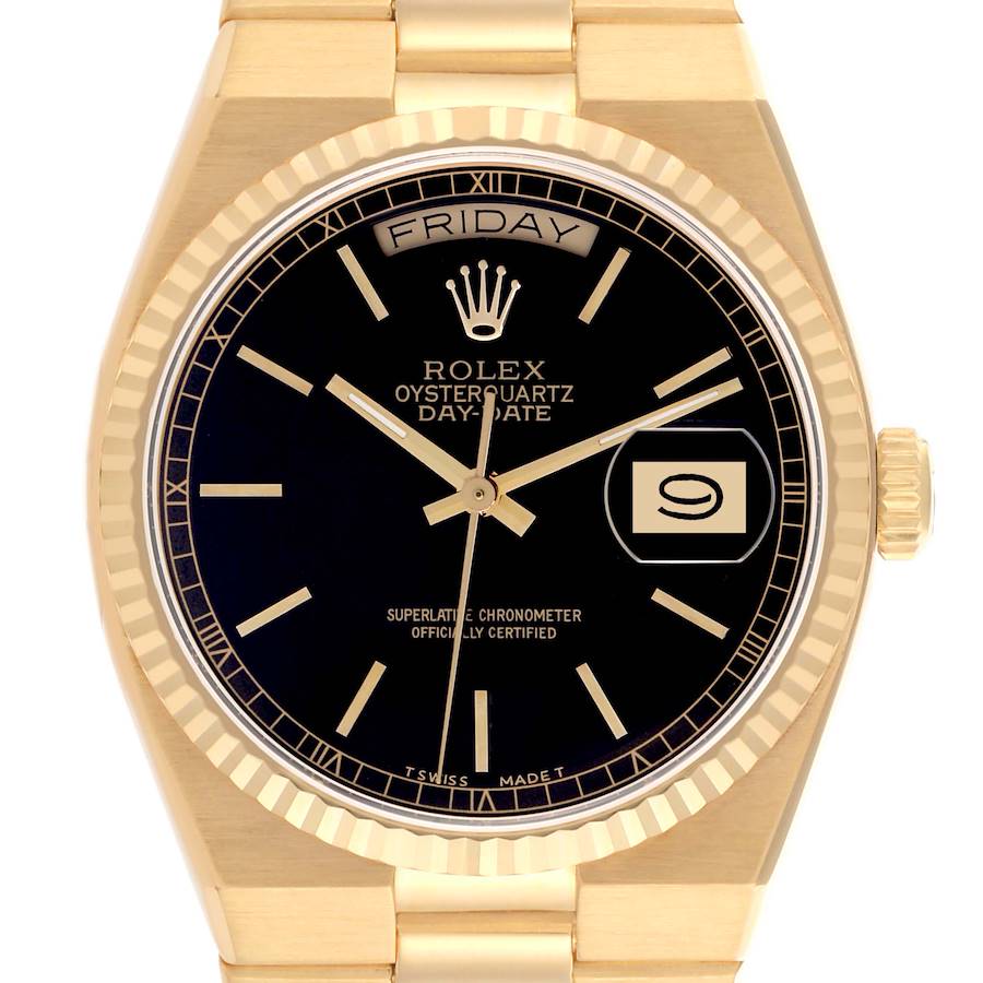 The Rolex Oysterquartz watch is shown from a front angle, displaying the face, bezel, and part of the bracelet.