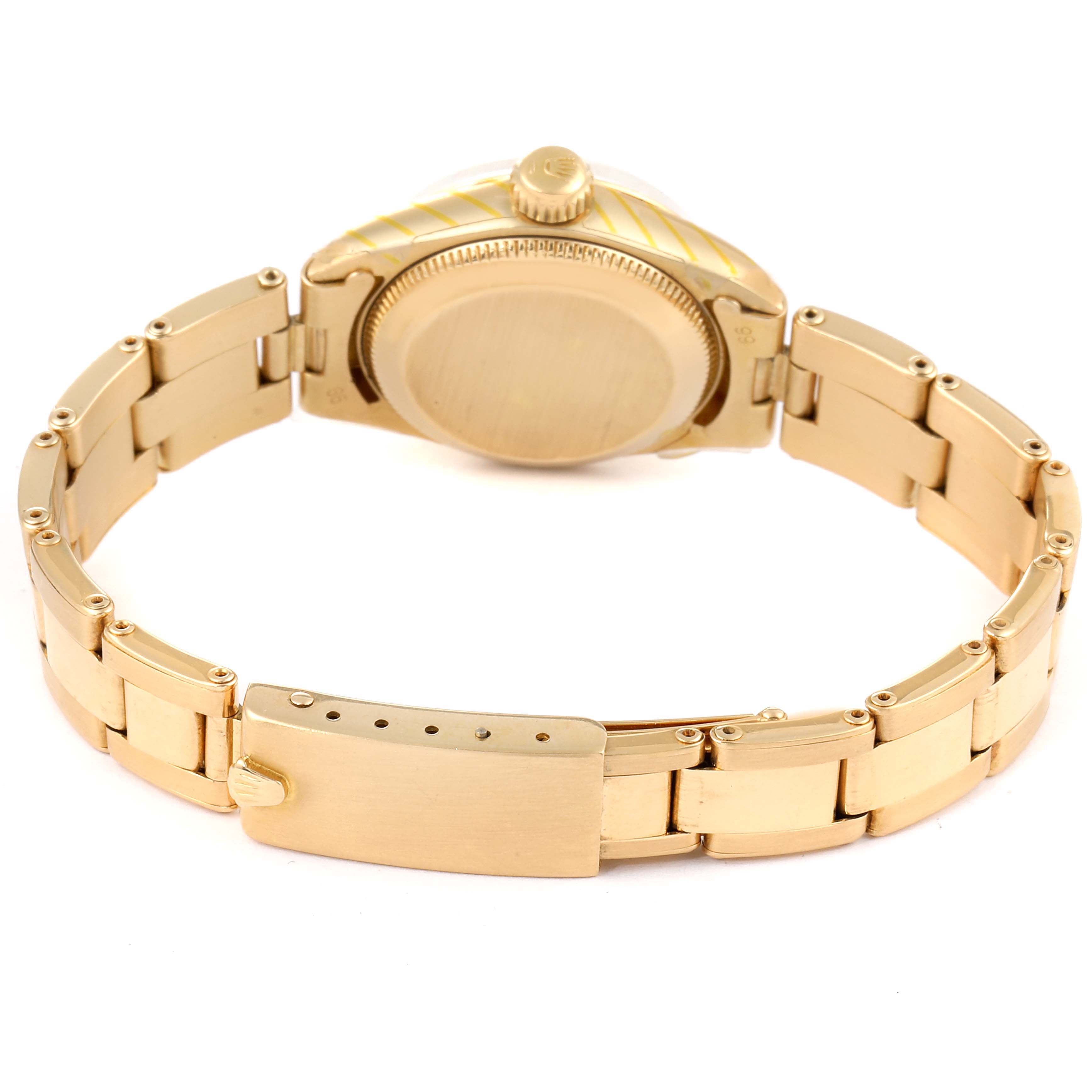 This image shows the back view of the Rolex President 6517 Women's Yellow Gold Silver Dial 6517 Women's Yellow Gold Silver Dial watch, featuring the case back, crown, and bracelet.