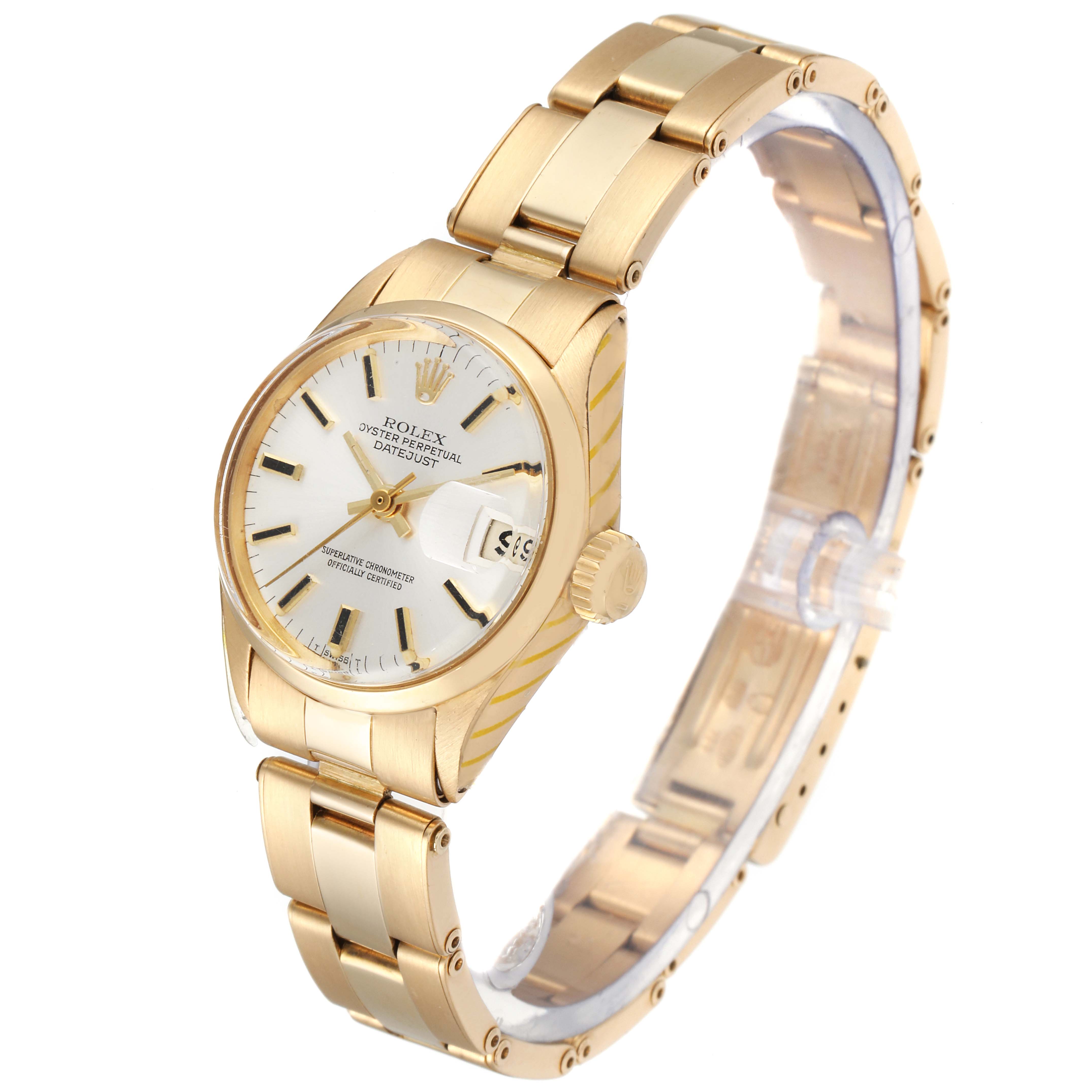 This Rolex President 6517 Women's Yellow Gold Silver Dial 6517 Women's Yellow Gold Silver Dial model watch is shown at an angle featuring the face, crown, and part of the bracelet.