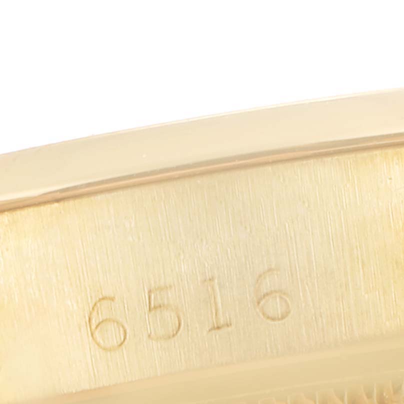 This close-up image shows the engraved model number on the inner case of the Rolex President 6517 Women's Yellow Gold Silver Dial 6517 Women's Yellow Gold Silver Dial watch.