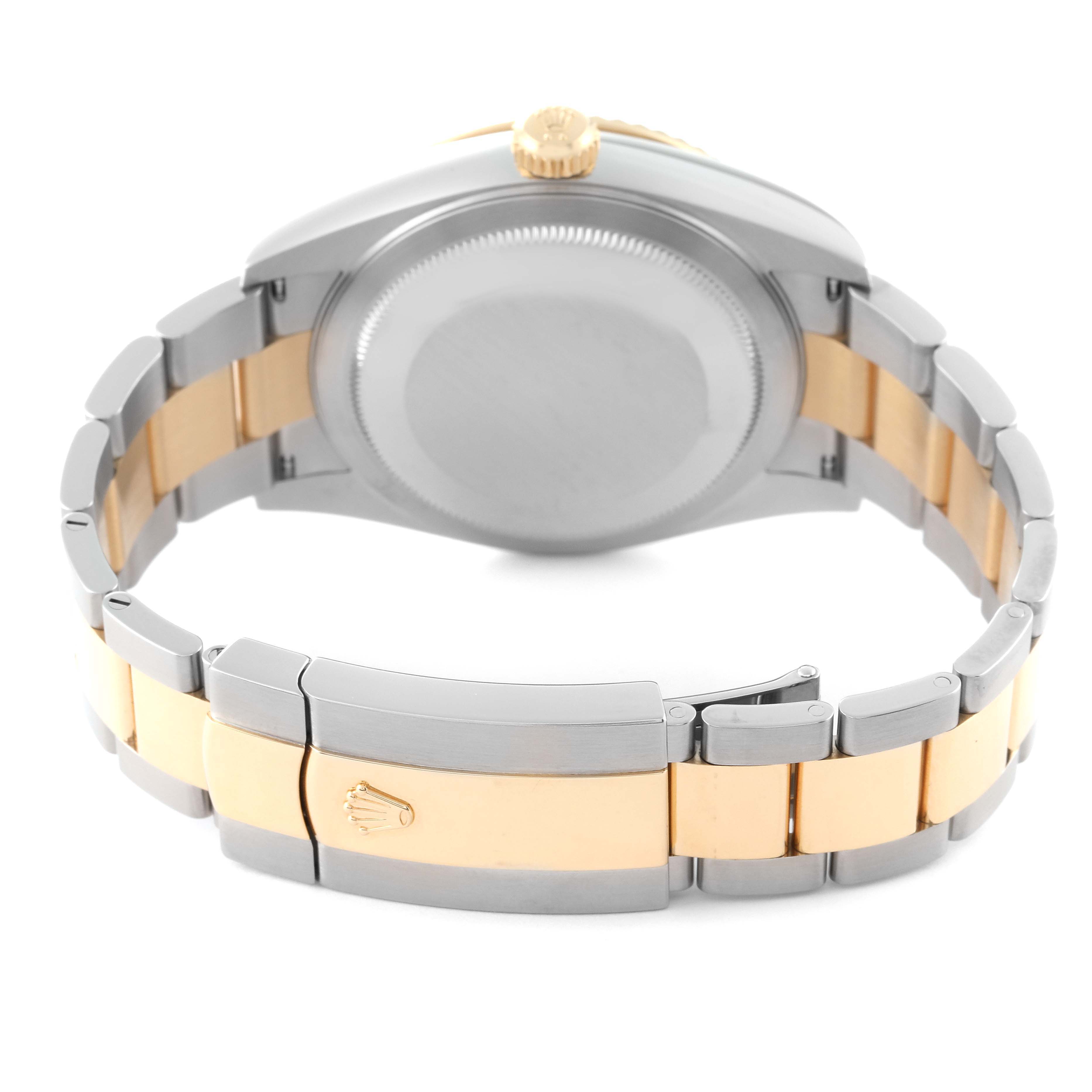 This image shows the back case and two-tone bracelet of a Rolex Sky-Dweller 326933 Men's Steel and Gold (two tone) Black Dial 326933 Men's Steel and Gold (two tone) Black Dial watch from a rear angle.