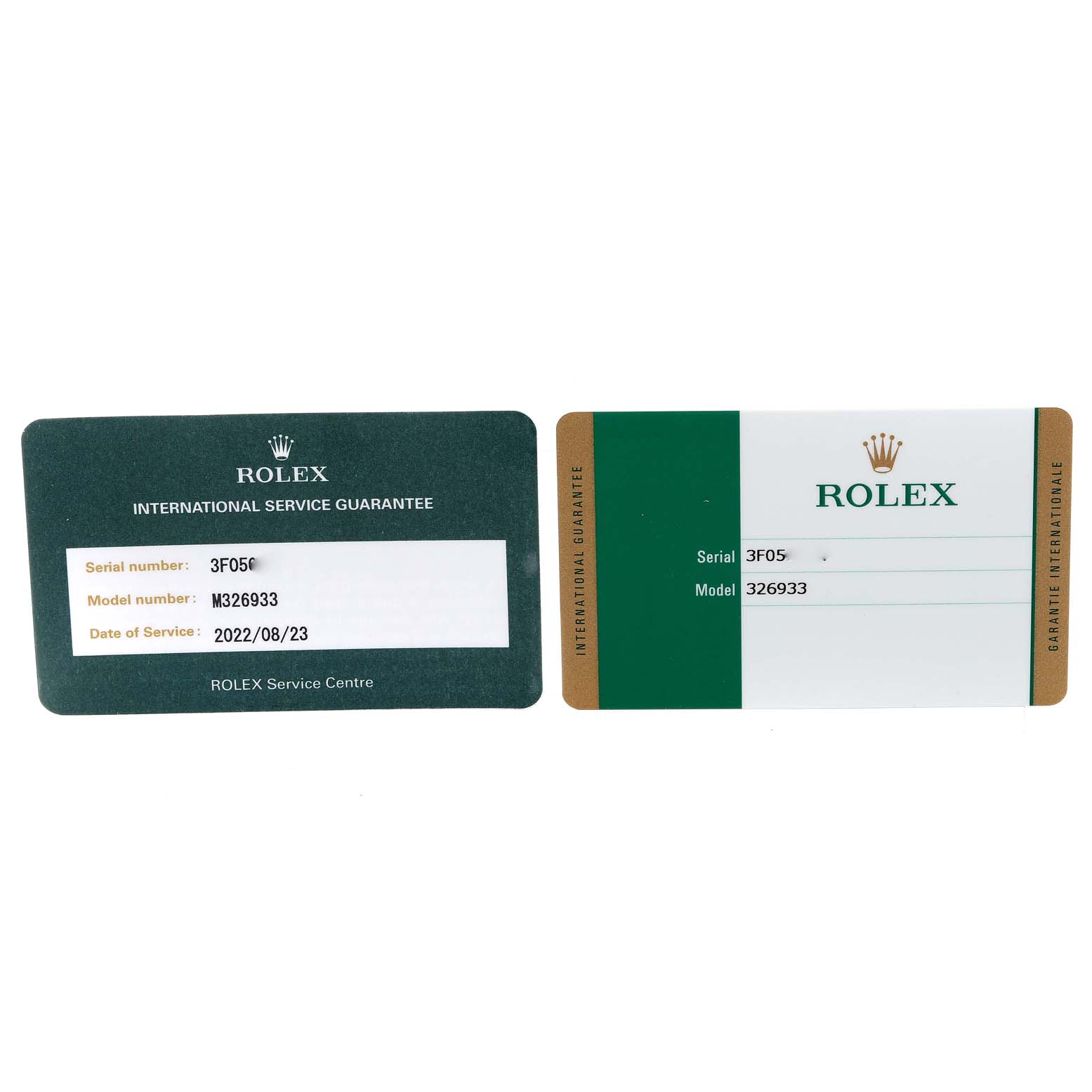 The image shows the international service guarantee and authenticity cards for a Rolex Sky-Dweller 326933 Men's Steel and Gold (two tone) Black Dial 326933 Men's Steel and Gold (two tone) Black Dial model M326933.