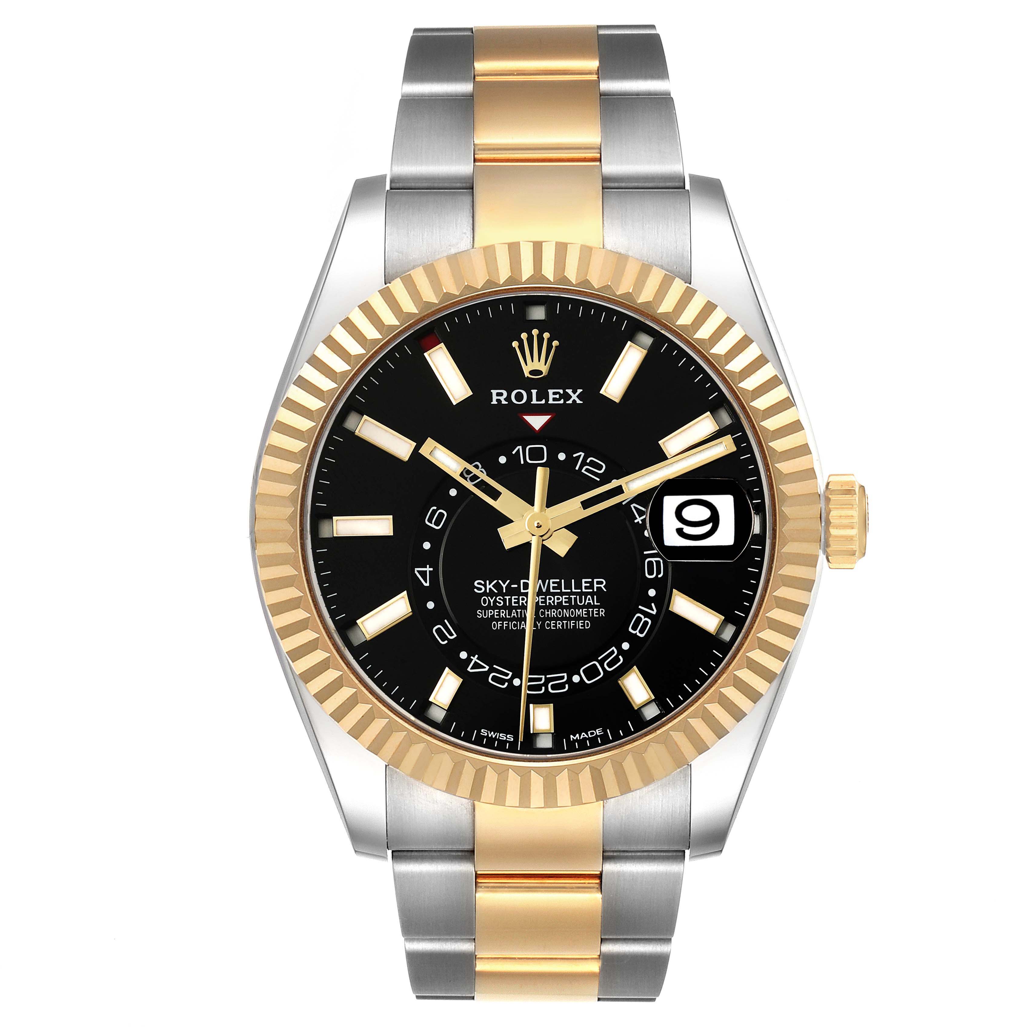 The image shows a Rolex Sky-Dweller 326933 Men's Steel and Gold (two tone) Black Dial 326933 Men's Steel and Gold (two tone) Black Dial watch from a front angle, featuring a black dial, gold fluted bezel, and bi-metal bracelet.