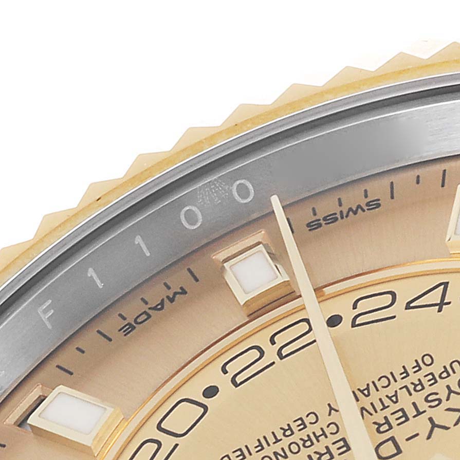 This close-up angle shows the face, bezel, and some indices of a Rolex Sky-Dweller 326933 Men's Steel and Gold (two tone) Champagne Dial 326933 Men's Steel and Gold (two tone) Champagne Dial watch.