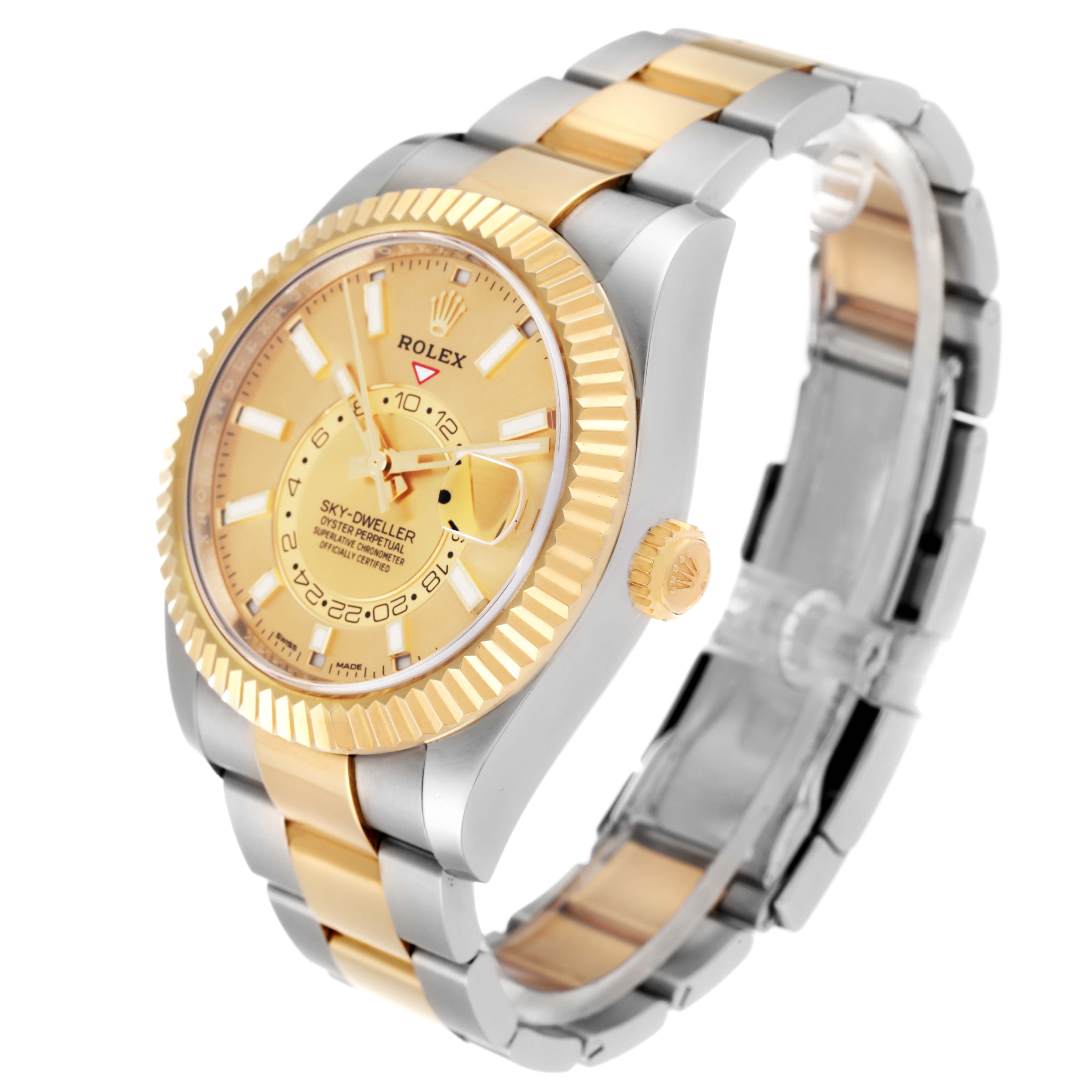 The image shows a Rolex Sky-Dweller 326933 Men's Steel and Gold (two tone) Champagne Dial 326933 Men's Steel and Gold (two tone) Champagne Dial watch at an angled side view, highlighting its gold bezel, dial, and two-tone bracelet.