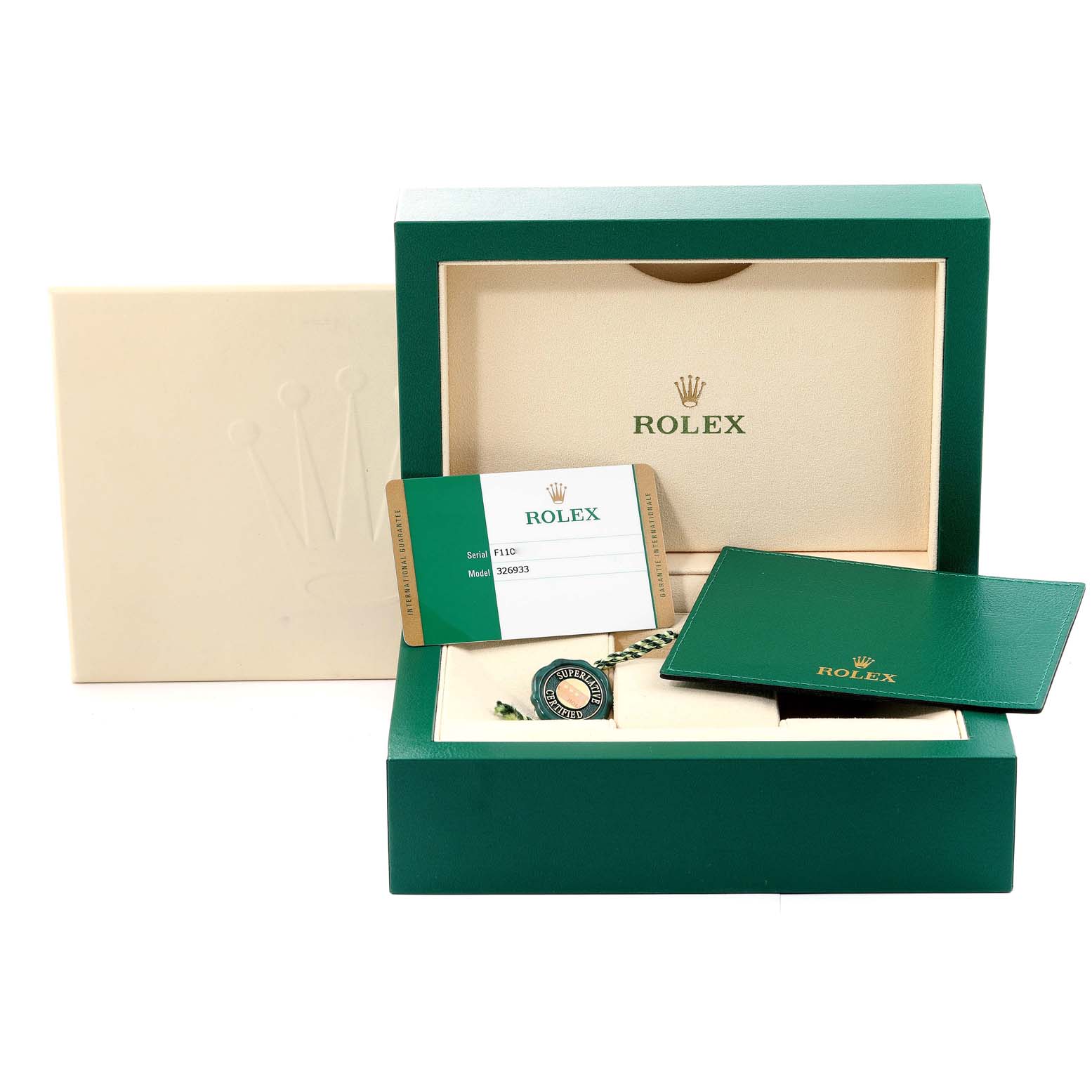 This image shows the packaging and accessories of the Rolex Sky-Dweller 326933 Men's Steel and Gold (two tone) Champagne Dial 326933 Men's Steel and Gold (two tone) Champagne Dial, including the box, card, booklet, and tag.