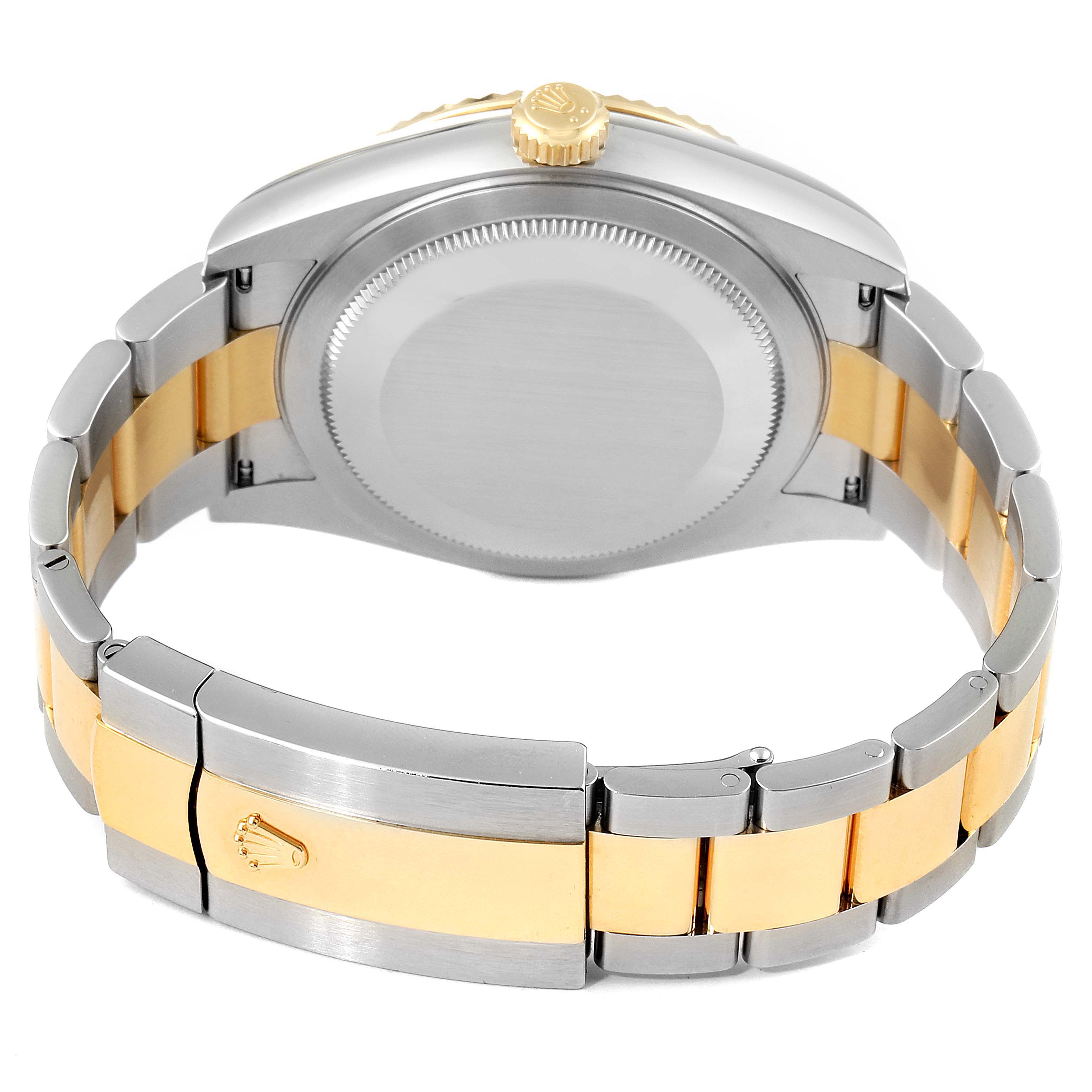This image shows the back and bracelet clasp of a Rolex Sky-Dweller 326933 Men's Steel and Gold (two tone) White Dial 326933 Men's Steel and Gold (two tone) White Dial watch, including the crown and links.