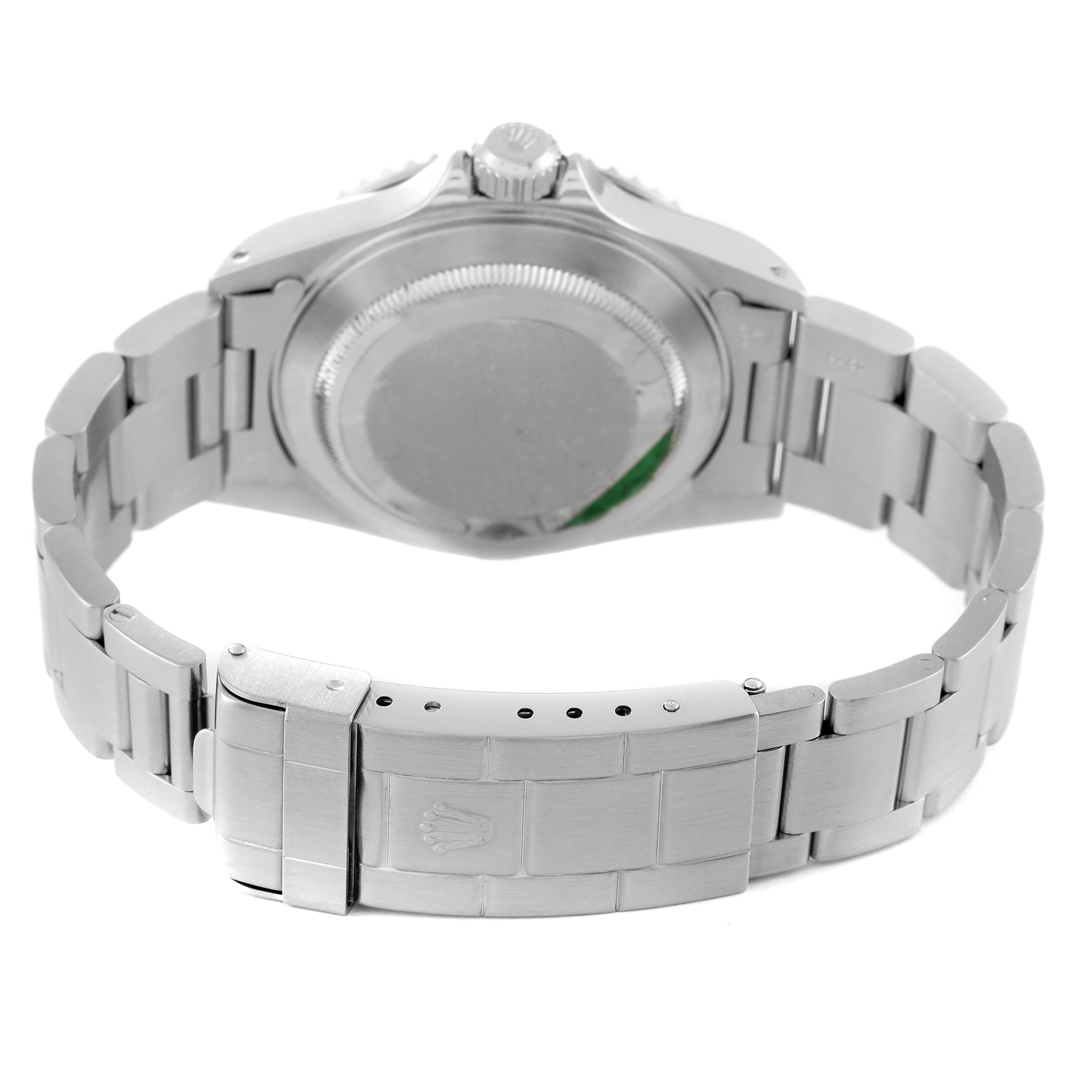 The image shows the back view of a Rolex Submariner 14060M Men's Stainless Steel Black Dial 14060M Men's Stainless Steel Black Dial watch, highlighting its case back and metal bracelet with the clasp visible.