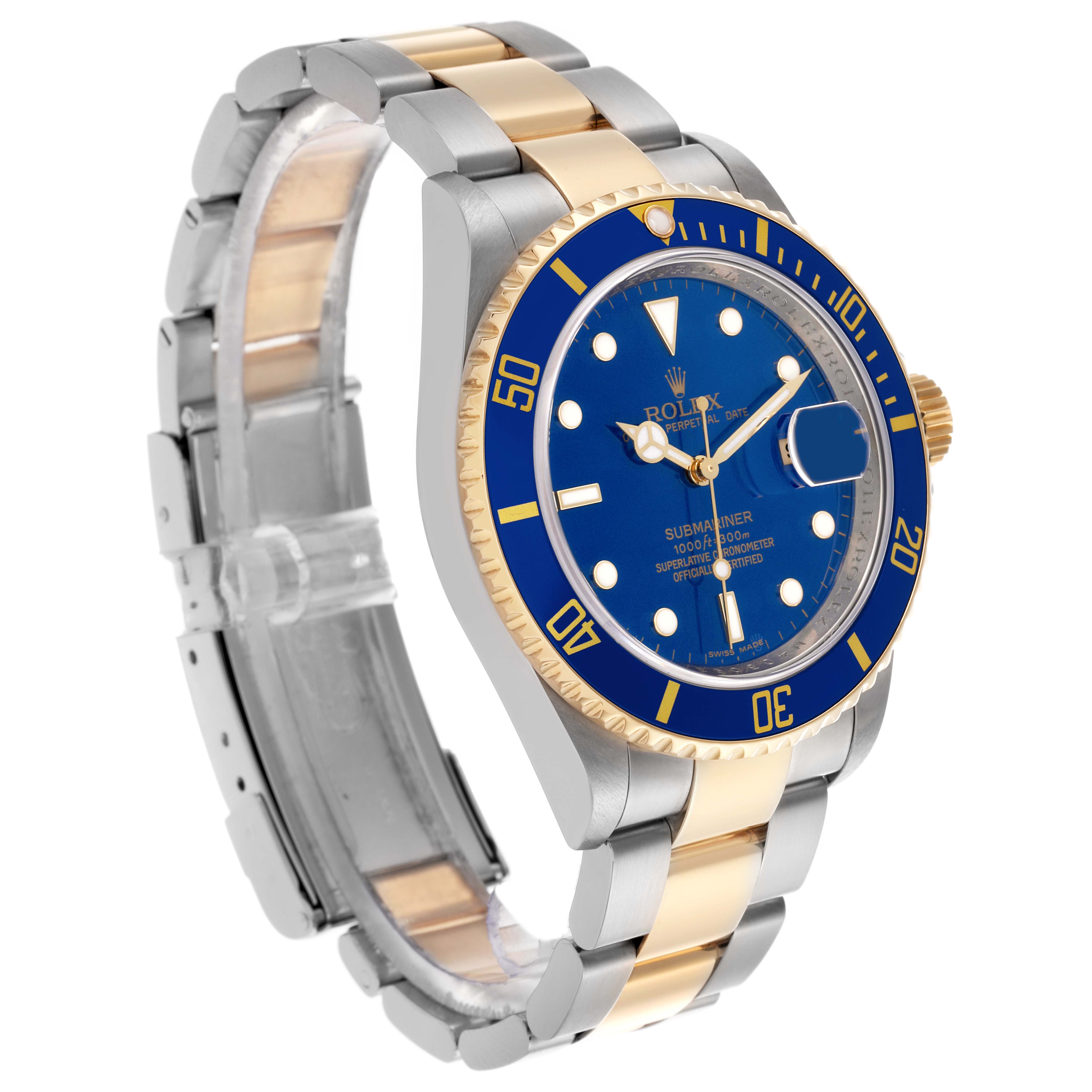 The Rolex Submariner 16613LB Men's Steel and Gold (two tone) Blue Dial 16613LB Men's Steel and Gold (two tone) Blue Dial watch is shown at a three-quarter angle, highlighting the blue bezel, dial, and two-tone bracelet.
