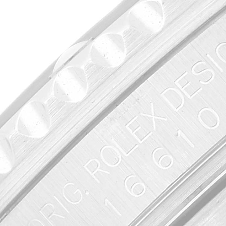 This image shows a close-up angle of the bezel and case side of a Rolex Submariner 16610 Men's Stainless Steel Black Dial 16610 Men's Stainless Steel Black Dial watch, highlighting its engraved model details.