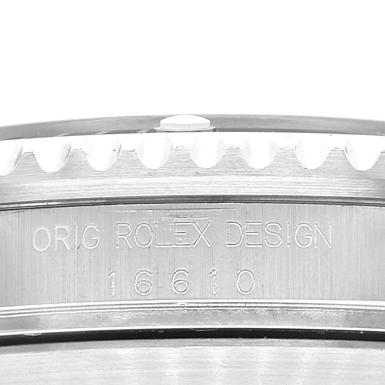 This image shows a close-up of the side of a Rolex Submariner 16610 Men
s Stainless Steel Black Dial 16610 Men
s Stainless Steel Black Dial watch model 16610, highlighting the engraved details.