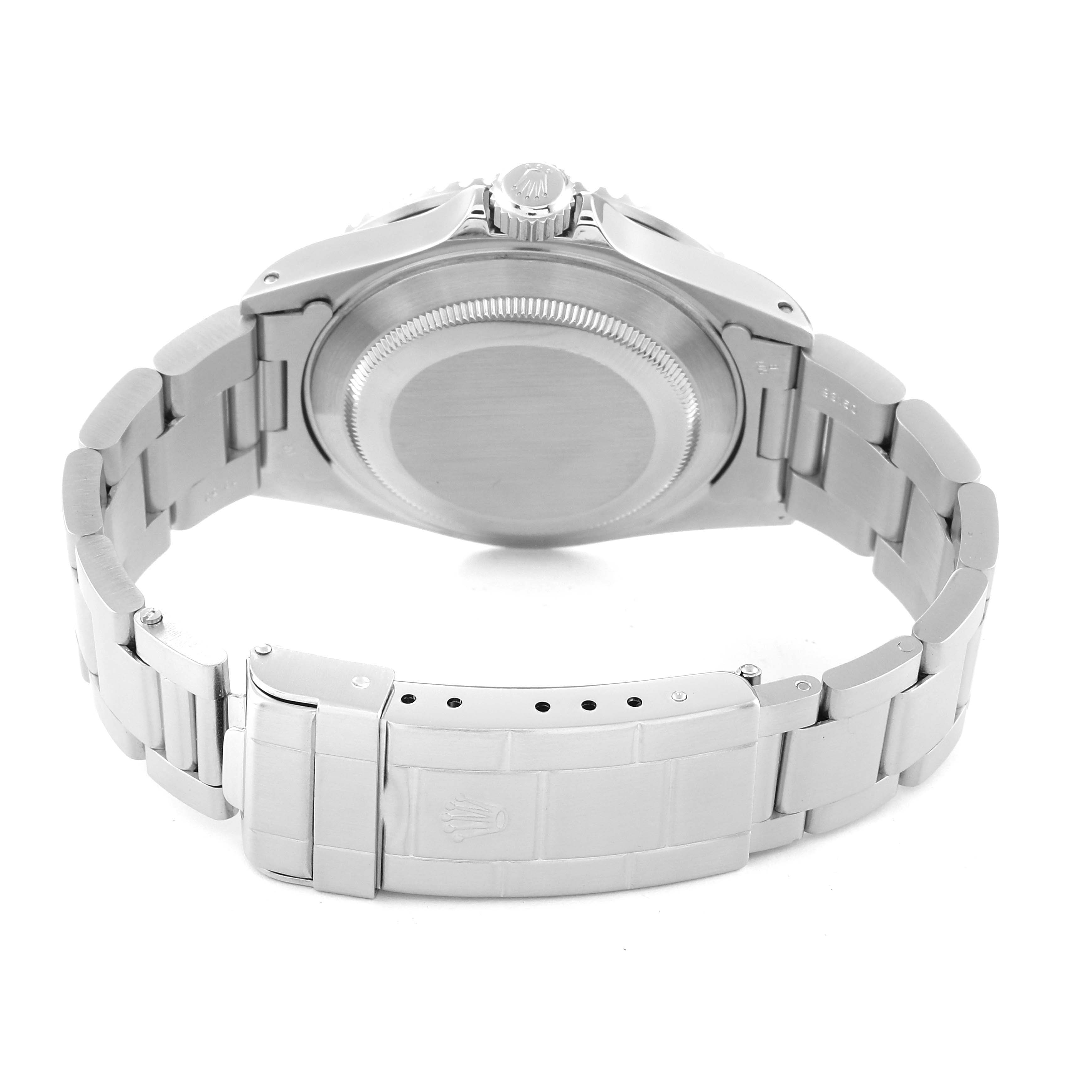 The image shows the back view of a Rolex Submariner 16610 Men
s Stainless Steel Black Dial 16610 Men
s Stainless Steel Black Dial watch, highlighting the case back, bracelet, and clasp.