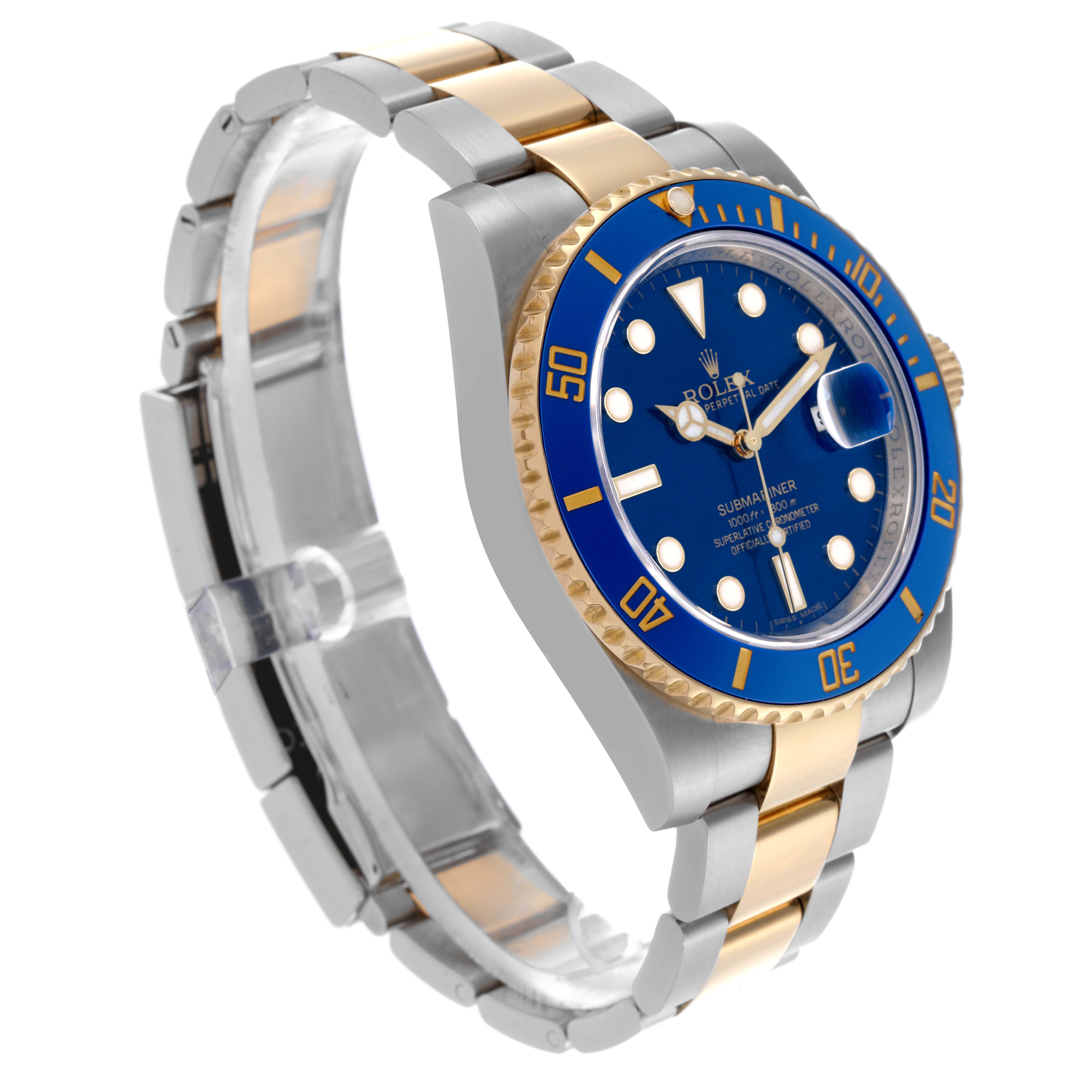 The Rolex Submariner 116613LB Men's Steel and Gold (two tone) Blue Dial 116613LB Men's Steel and Gold (two tone) Blue Dial watch is shown at an angle highlighting its blue dial, bezel, two-tone bracelet, and crown.