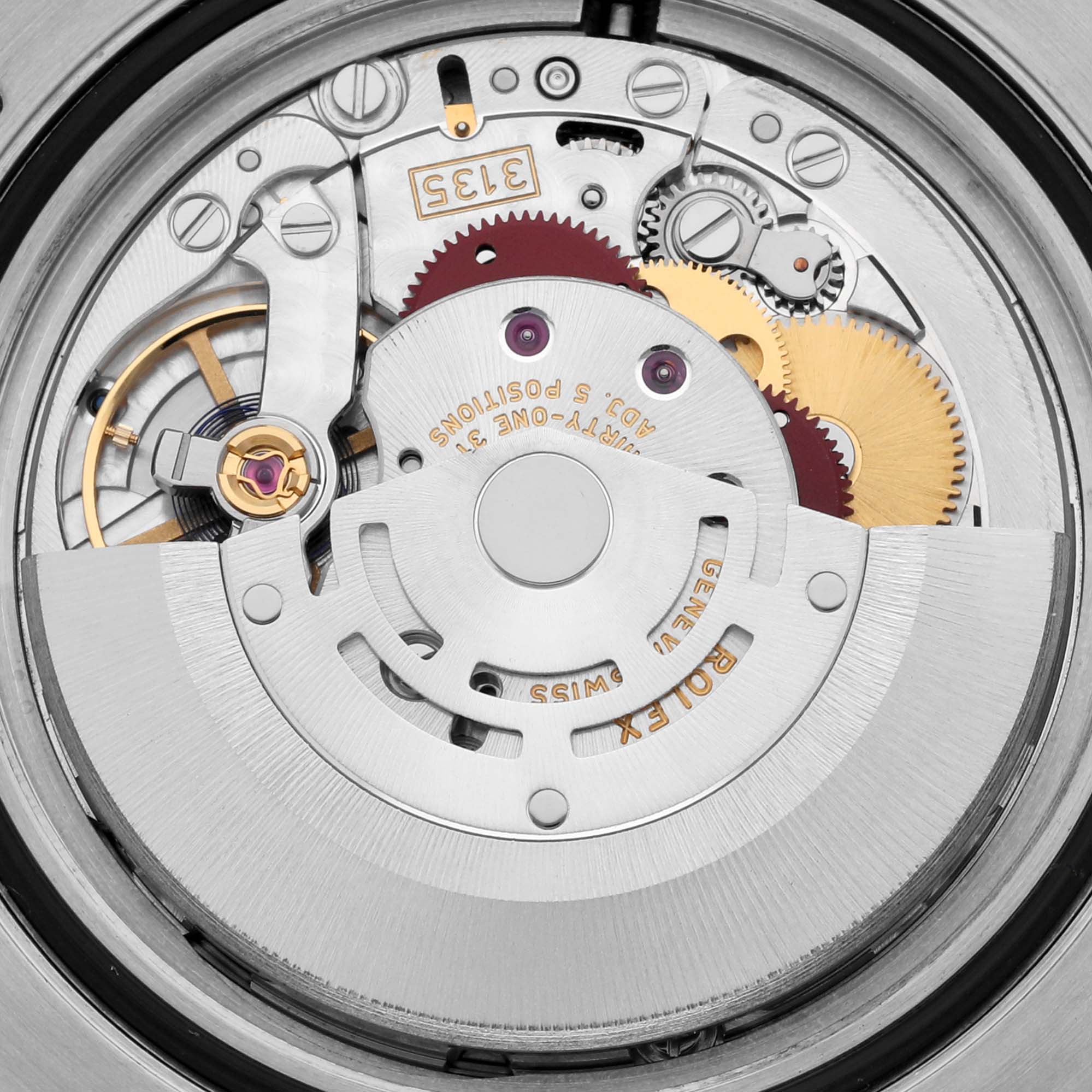 The image shows the movement of a Rolex Submariner 116613LB Men's Steel and Gold (two tone) Blue Dial 116613LB Men's Steel and Gold (two tone) Blue Dial watch, highlighting its gears and mechanical components from a top view.
