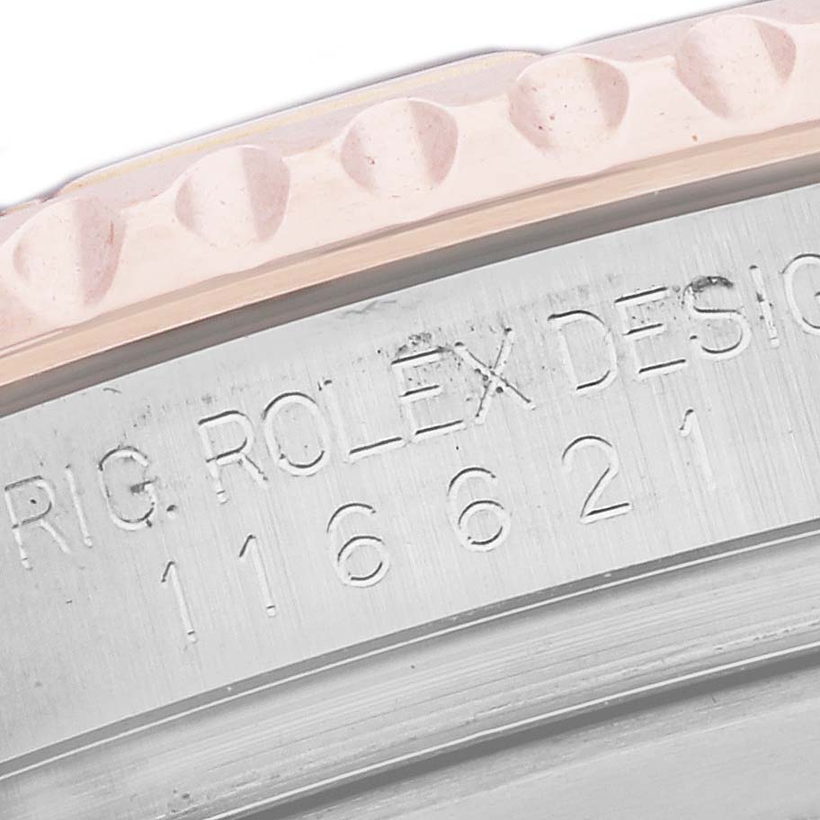 The image shows a close-up of the bezel and case edge of a Rolex Yacht-Master 116621 Men's Steel and Gold (two tone) Brown Dial 116621 Men's Steel and Gold (two tone) Brown Dial, highlighting engraved details.