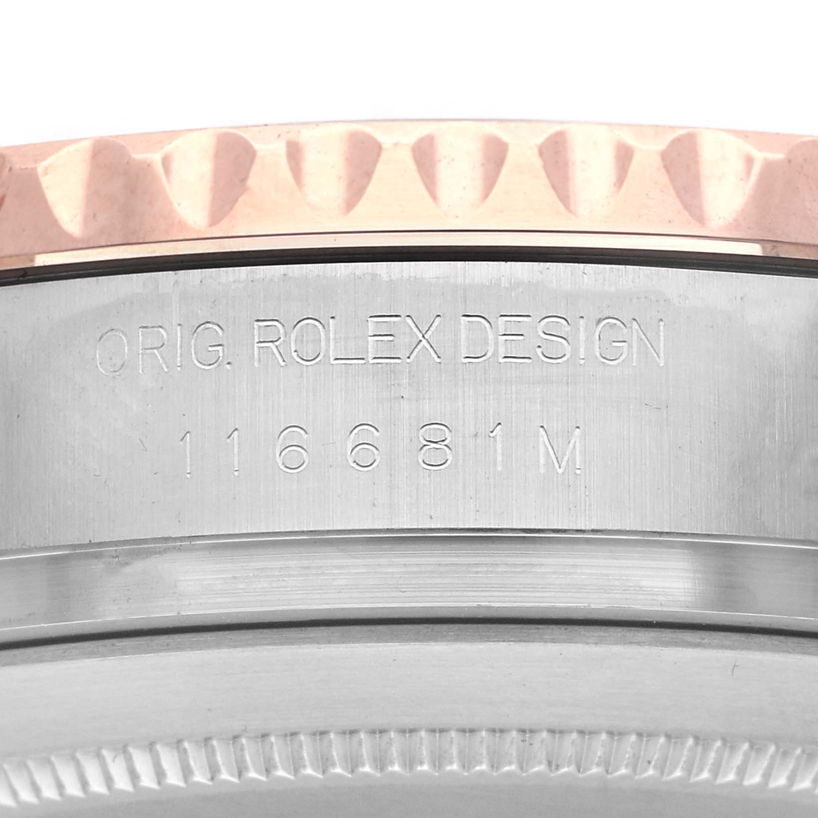 The image shows a close-up side view of the Rolex Yacht-Master 116681 Men's Steel and Gold (two tone) White Dial 116681 Men's Steel and Gold (two tone) White Dial's bezel and engraved case with the model number.