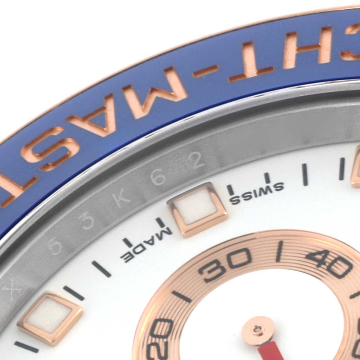 The image shows a close-up of the dial and bezel of the Rolex Yacht-Master 116681 Men's Steel and Gold (two tone) White Dial 116681 Men's Steel and Gold (two tone) White Dial, focusing on the markings and design details.