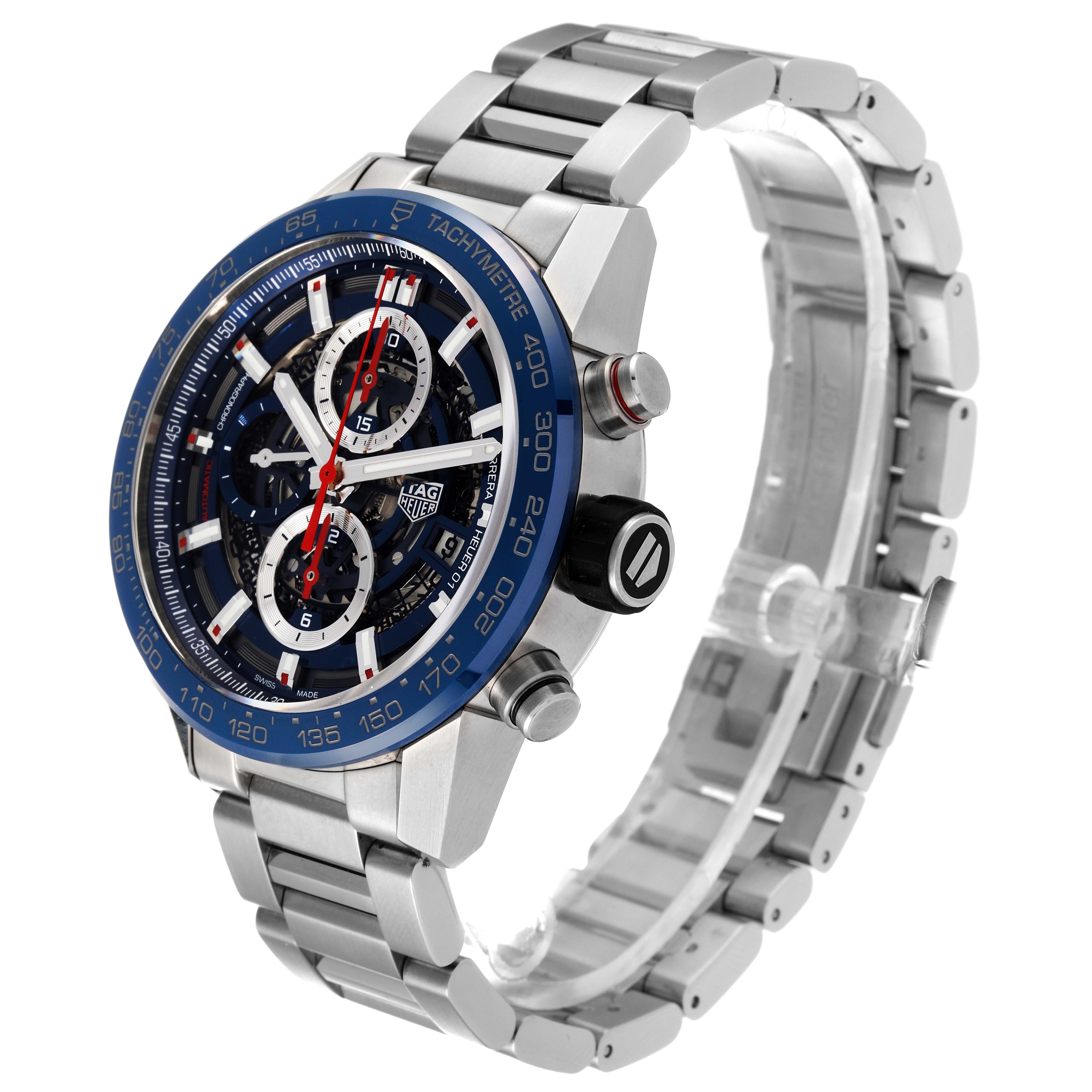 The image showcases a Tag Heuer Carrera CAR201T Men's Stainless Steel Blue Dial CAR201T Men's Stainless Steel Blue Dial model watch at an angle highlighting its face, side buttons, and metal strap.