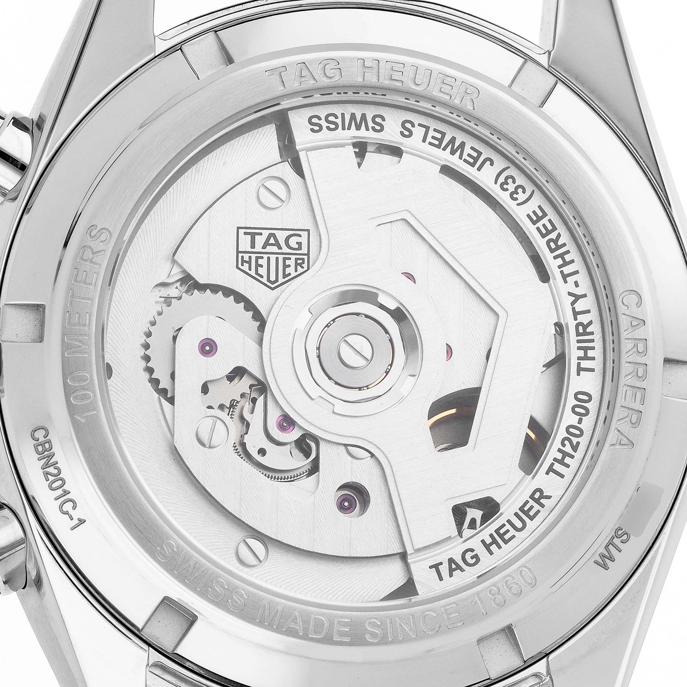 The image shows the case back of a Tag Heuer Carrera CBN201C.FC6542 Men's Stainless Steel Black Dial, highlighting its movement and engravings.