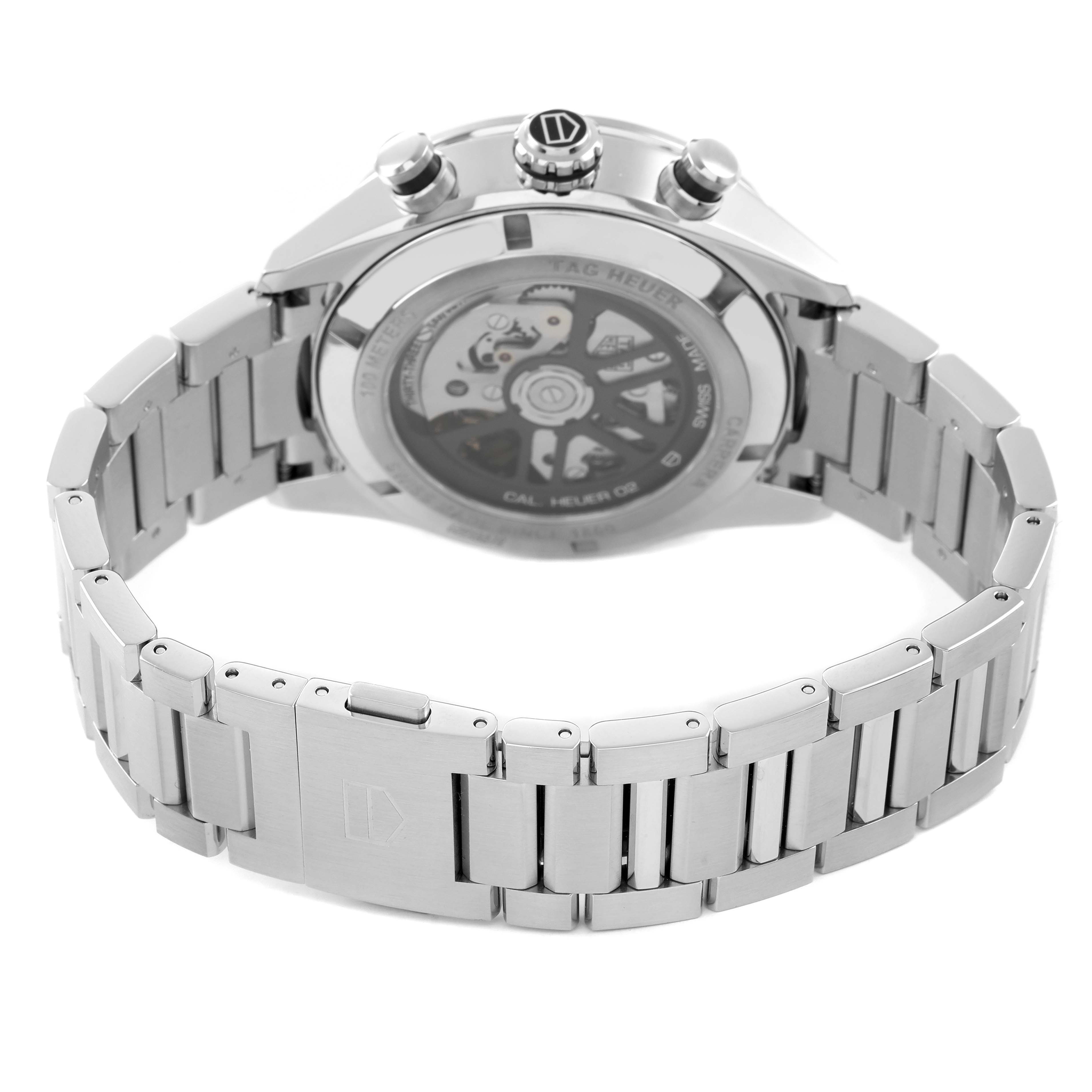 The image shows the back view of a Tag Heuer Carrera CBN2A10.BA0643 Men's Stainless Steel Green Dial watch, highlighting the bracelet and the transparent case back.