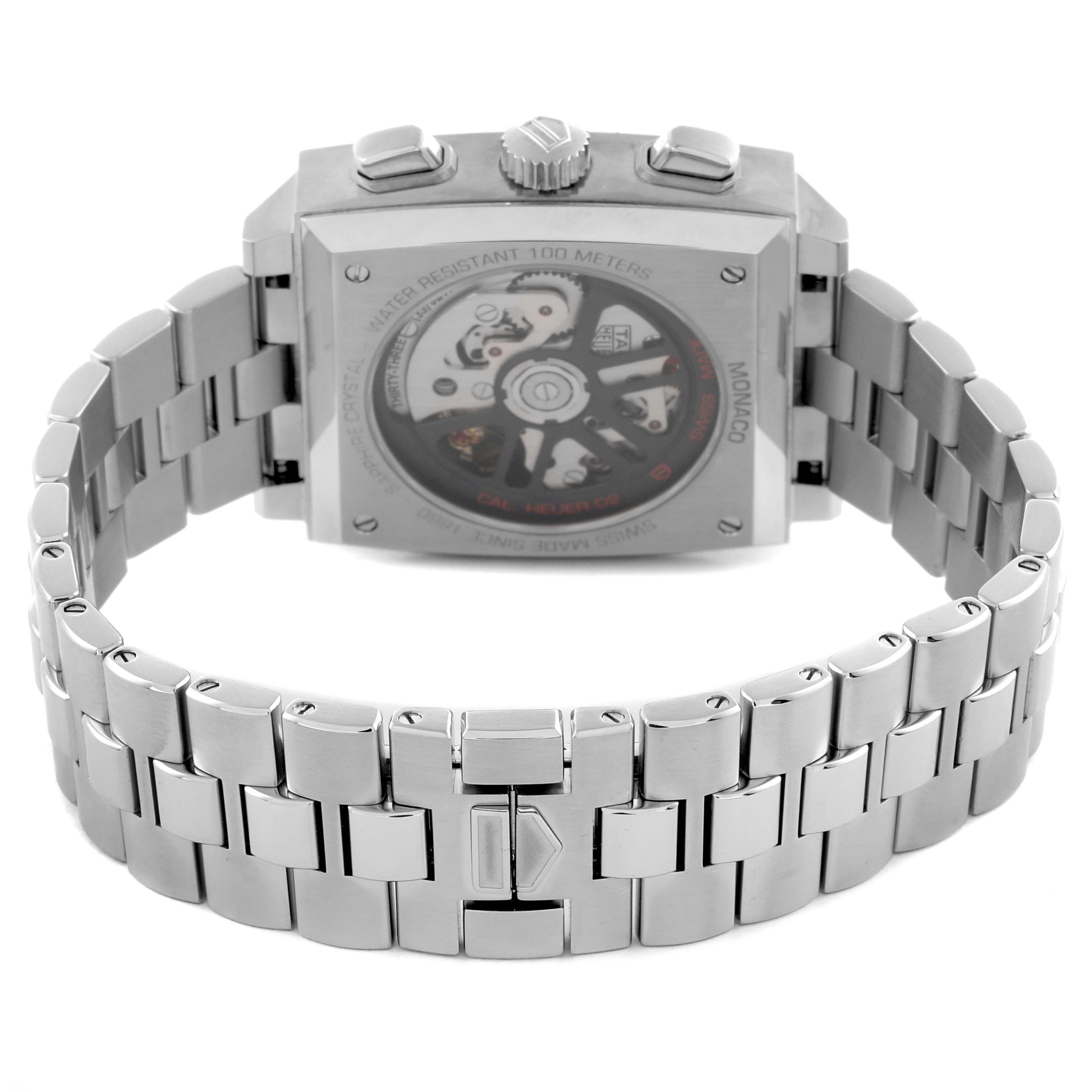 The image shows the back case and bracelet of the Tag Heuer Monaco CBL2111.BA0644 Men's Stainless Steel Blue Dial CBL2111.BA0644 Men's Stainless Steel Blue Dial watch, highlighting the mechanical movement.
