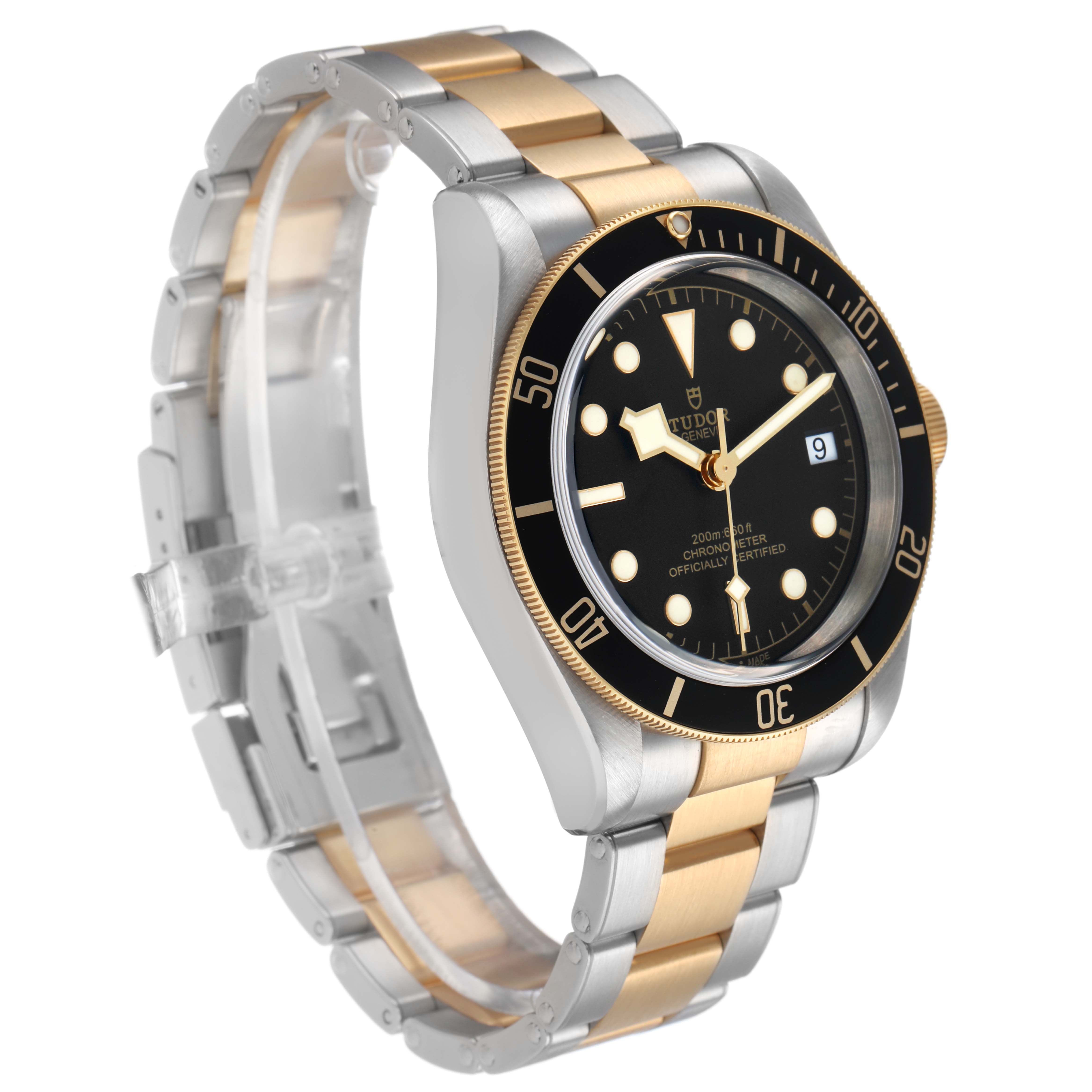 The Tudor Heritage Black Bay 79733N Men's Steel and Gold (two tone) Black Dial watch is shown at a three-quarter angle, highlighting its bezel, dial, and two-tone bracelet.