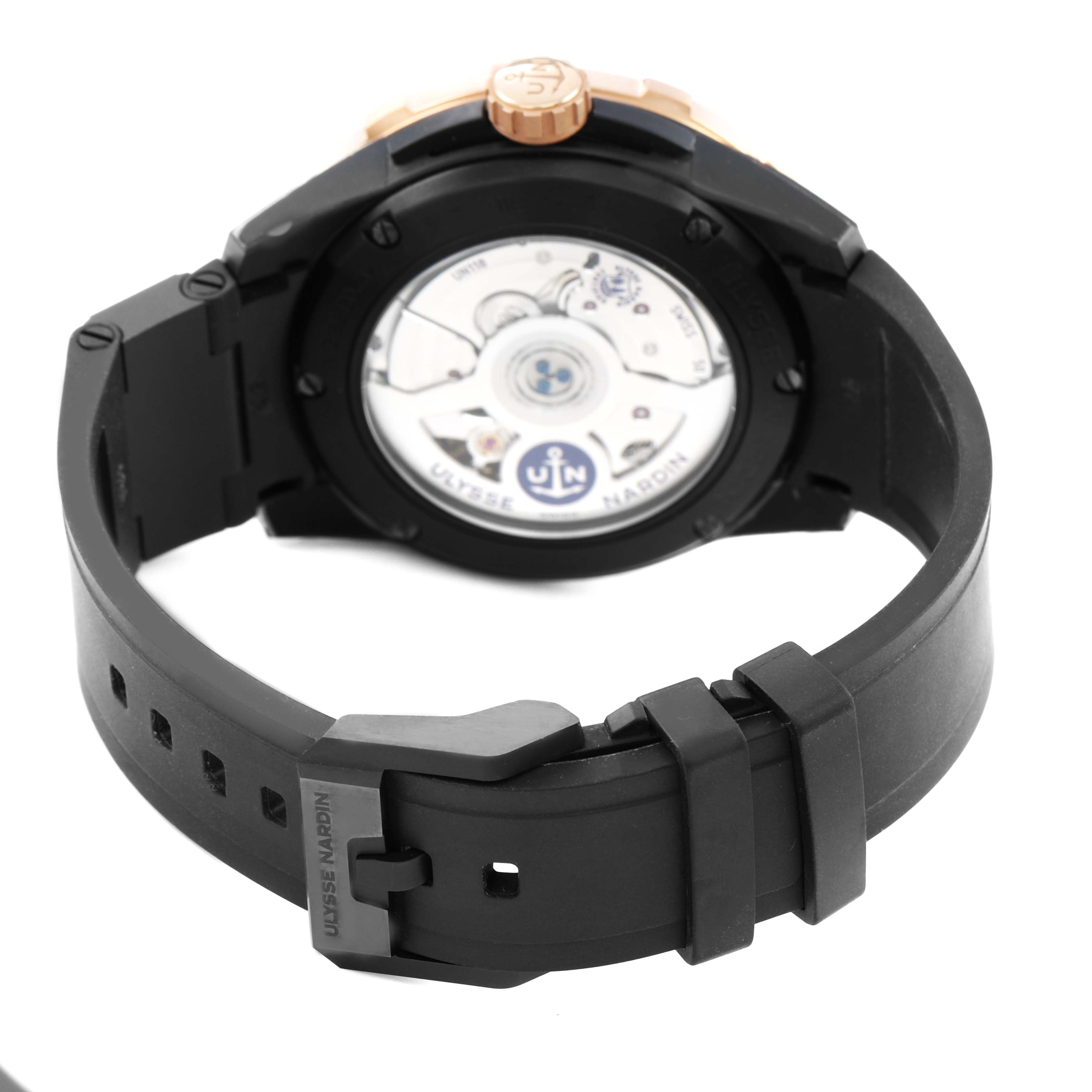 The image shows the back and clasp of the Ulysse Nardin Diver 1185-170 Men's Titanium Black Dial model, highlighting the movement through a transparent case back.