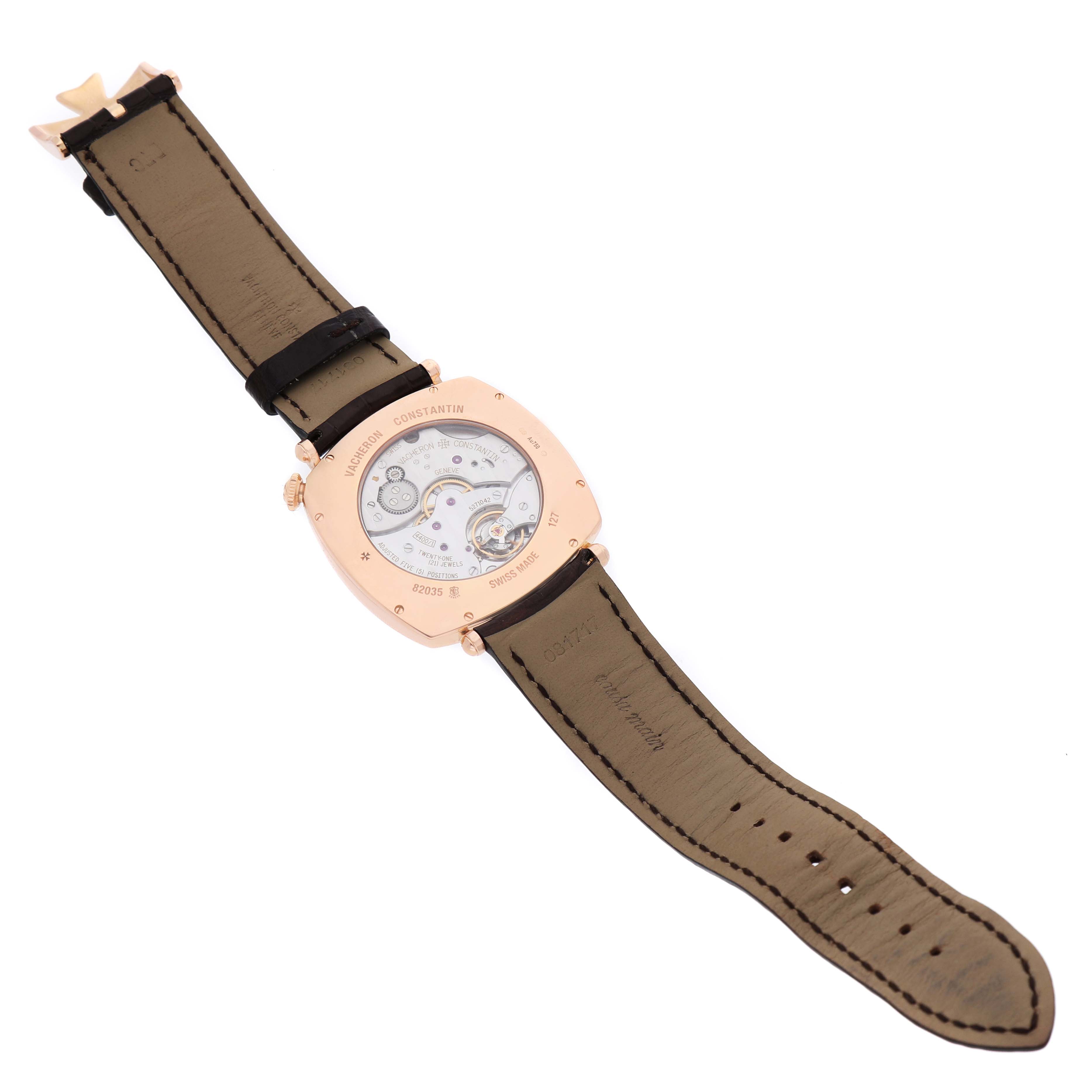 The Vacheron Constantin Historiques 82035 Men's Rose Gold Silver Dial watch is shown from the back, displaying the movement through a transparent case back.