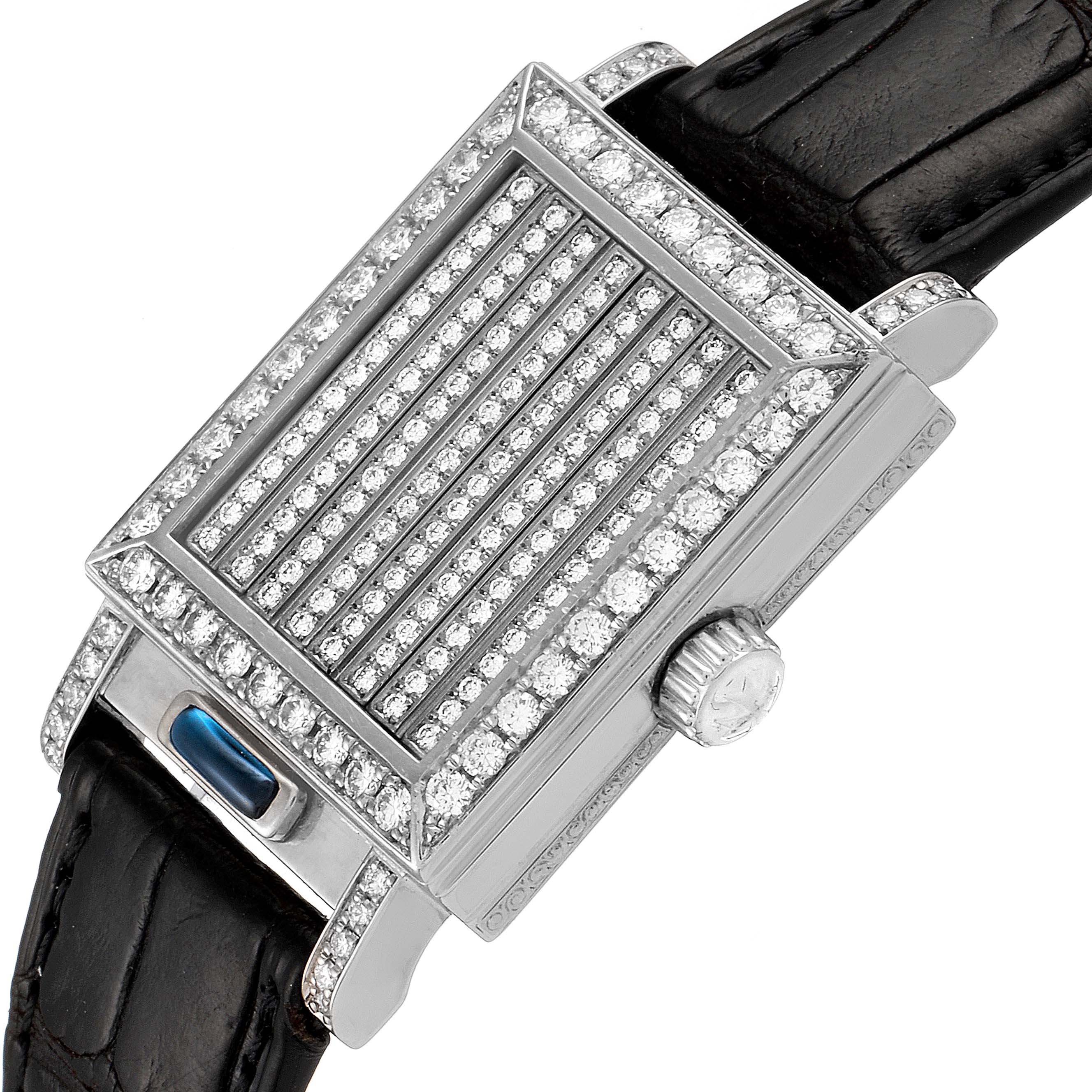This image shows a close-up angled view of a Vintage Vacheron Constantin watch, highlighting its rectangular, diamond-encrusted face and leather strap.