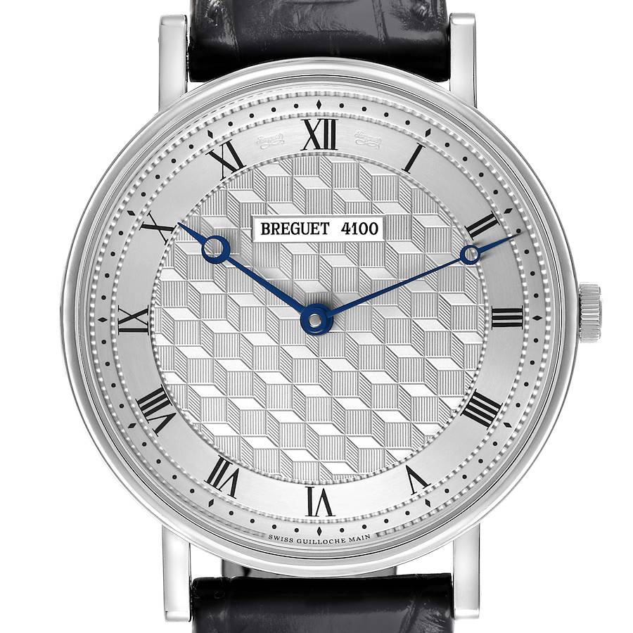 The Breguet Classique watch is shown from a frontal angle, highlighting its textured dial, Roman numerals, and blue hands.