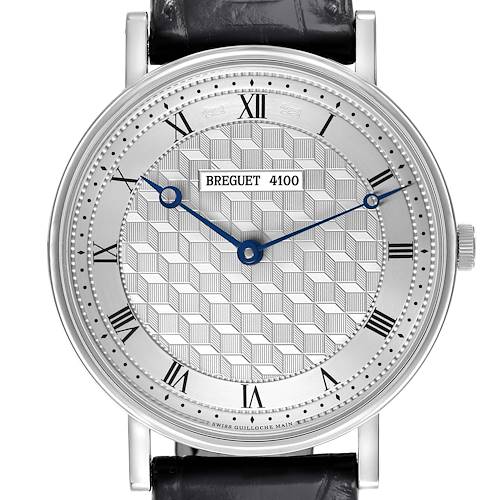 The Breguet Classique watch is shown from a front view, displaying its dial, hands, and Roman numerals.